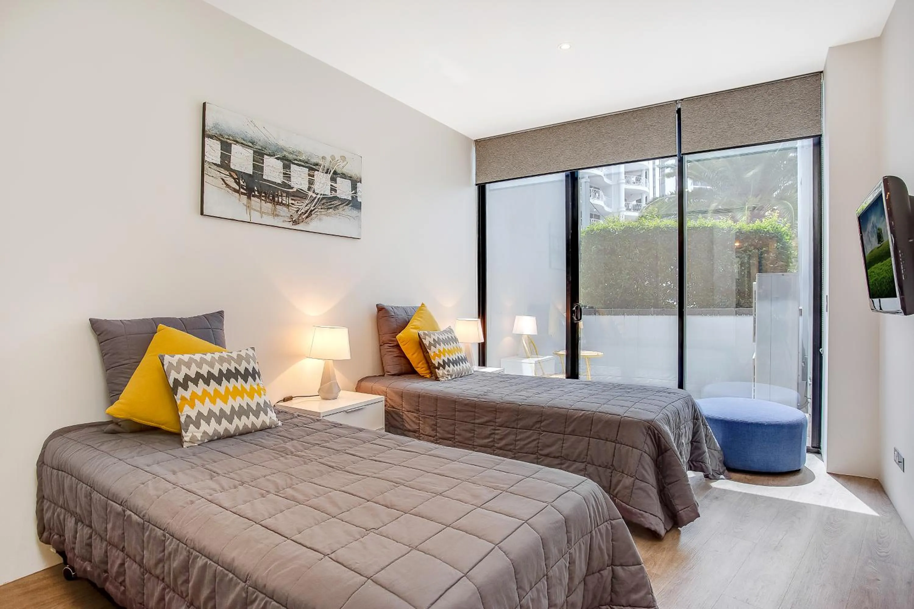 Bed in Aria Apartments