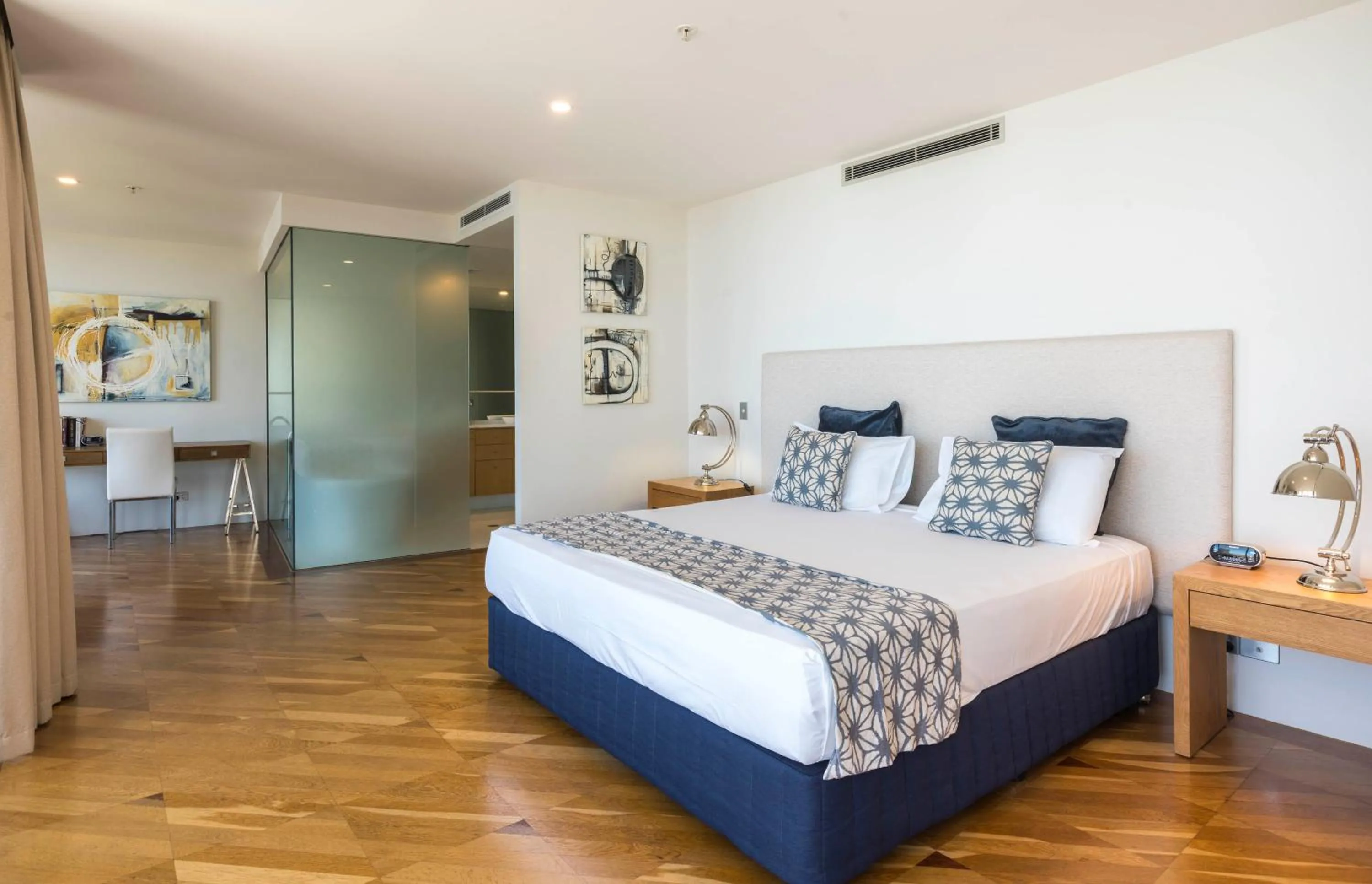 Bed in Aria Apartments