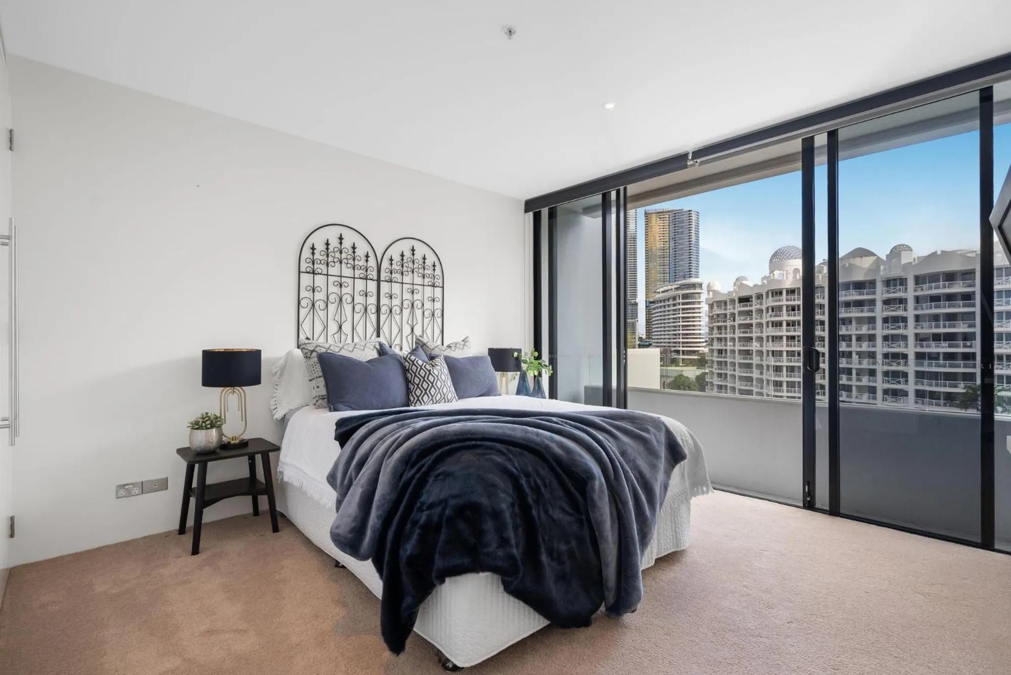 Bed in Aria Apartments