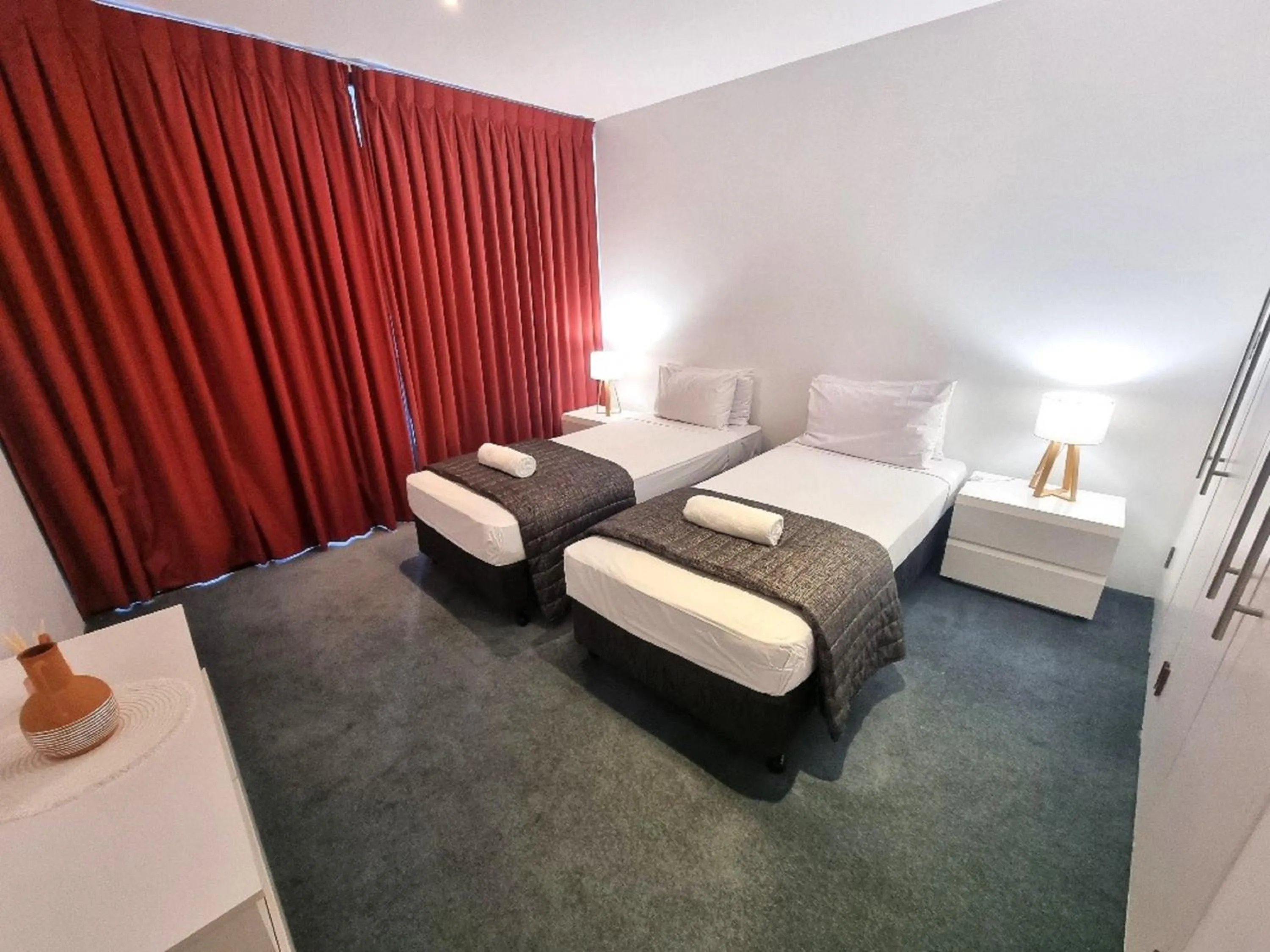 Bed in Aria Apartments