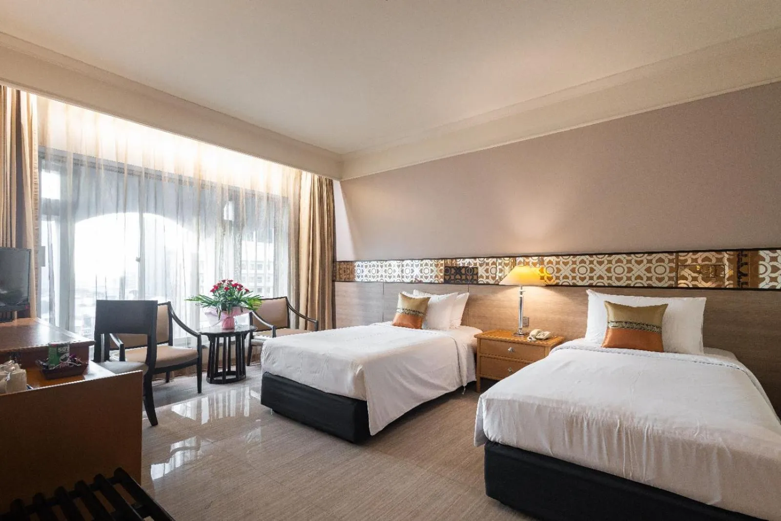 Bed in Indra Regent Hotel