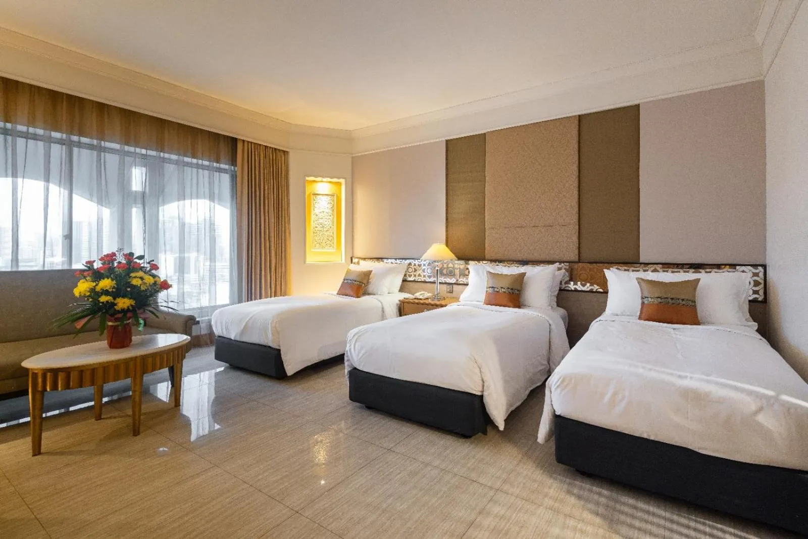 Bed in Indra Regent Hotel