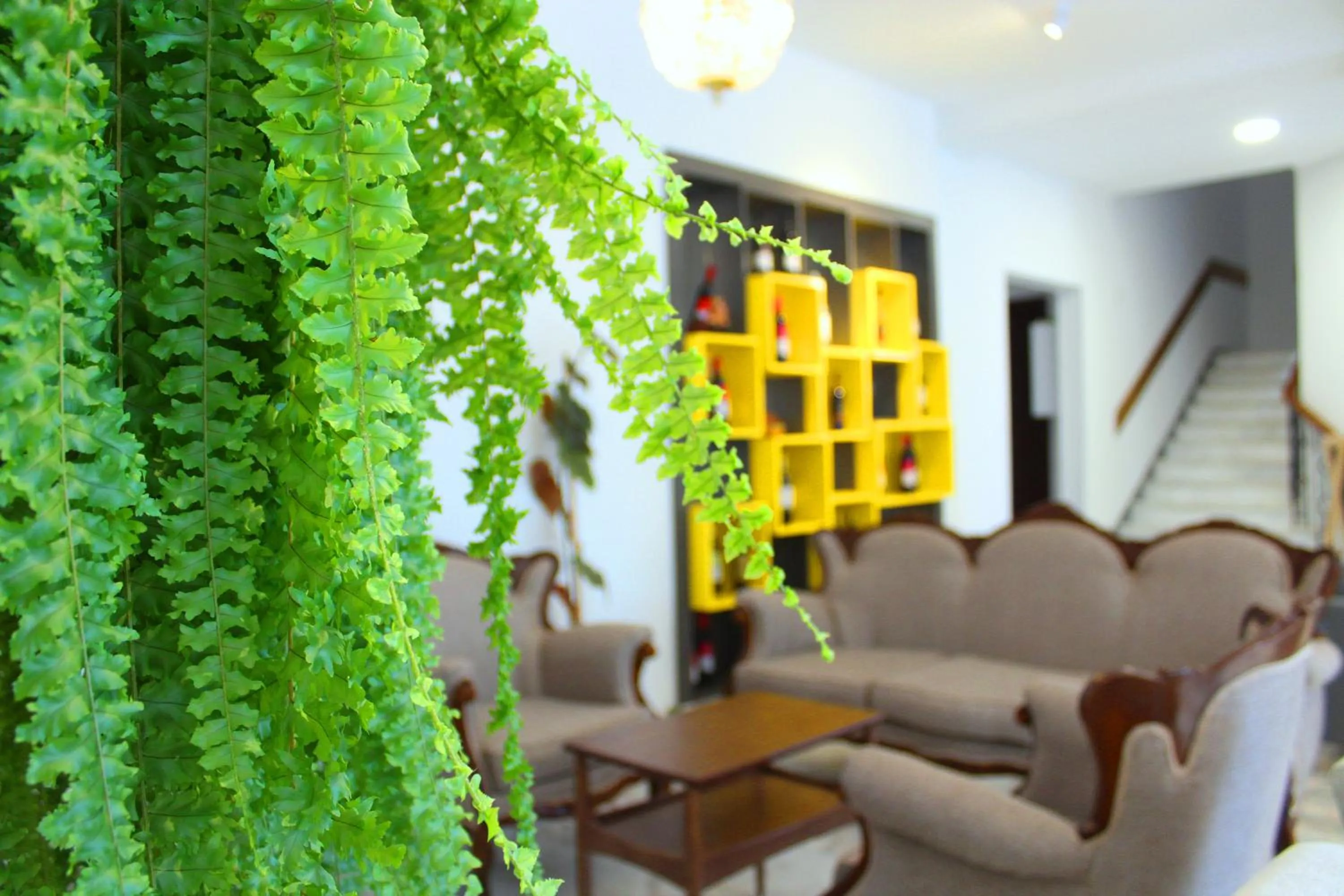 Communal lounge/ TV room in Alliance Hotel