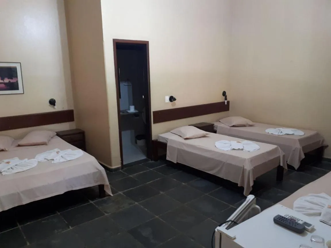 Photo of the whole room, Bed in Pousada Canto do Rio