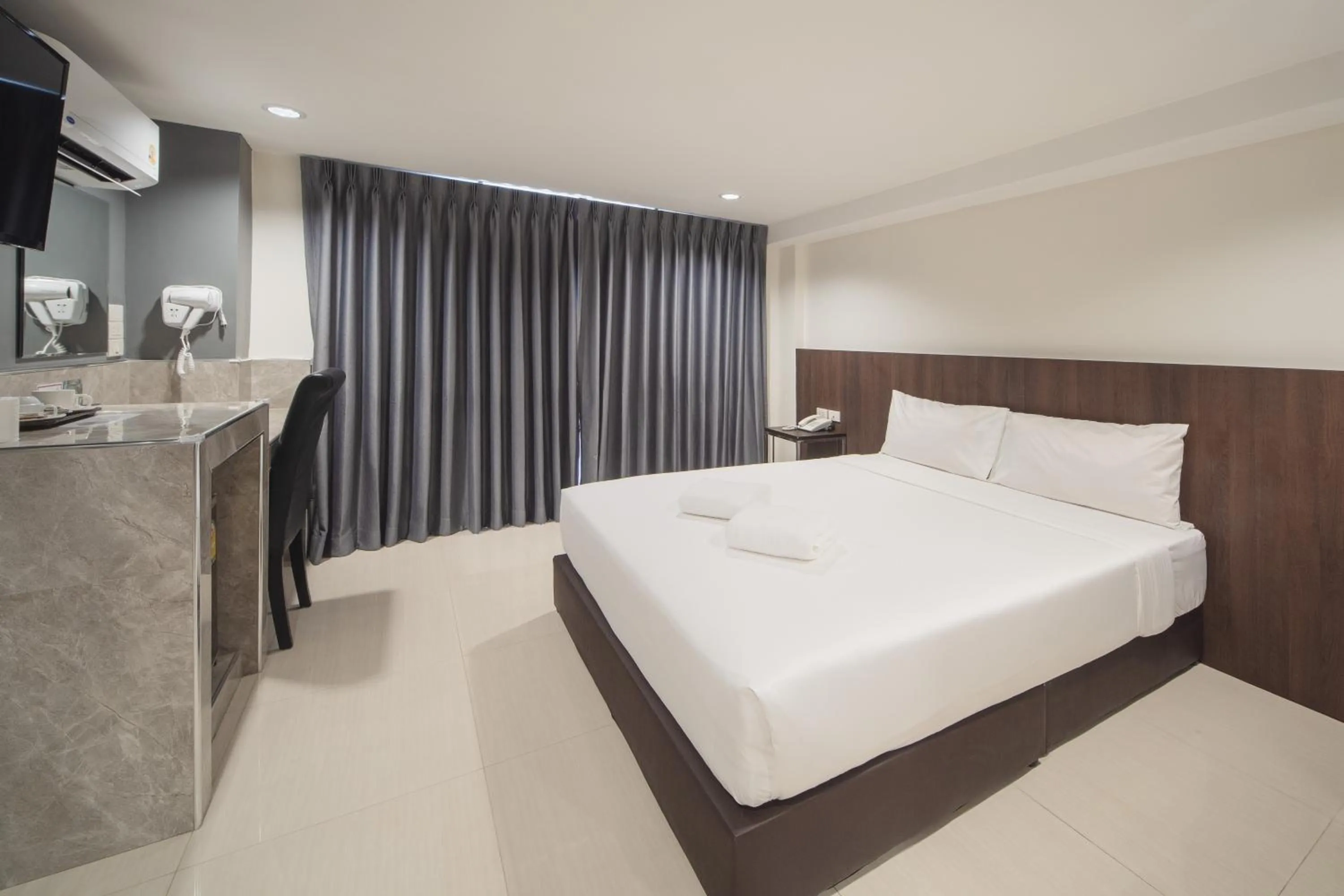 Bed in Grand Alpine Hotel