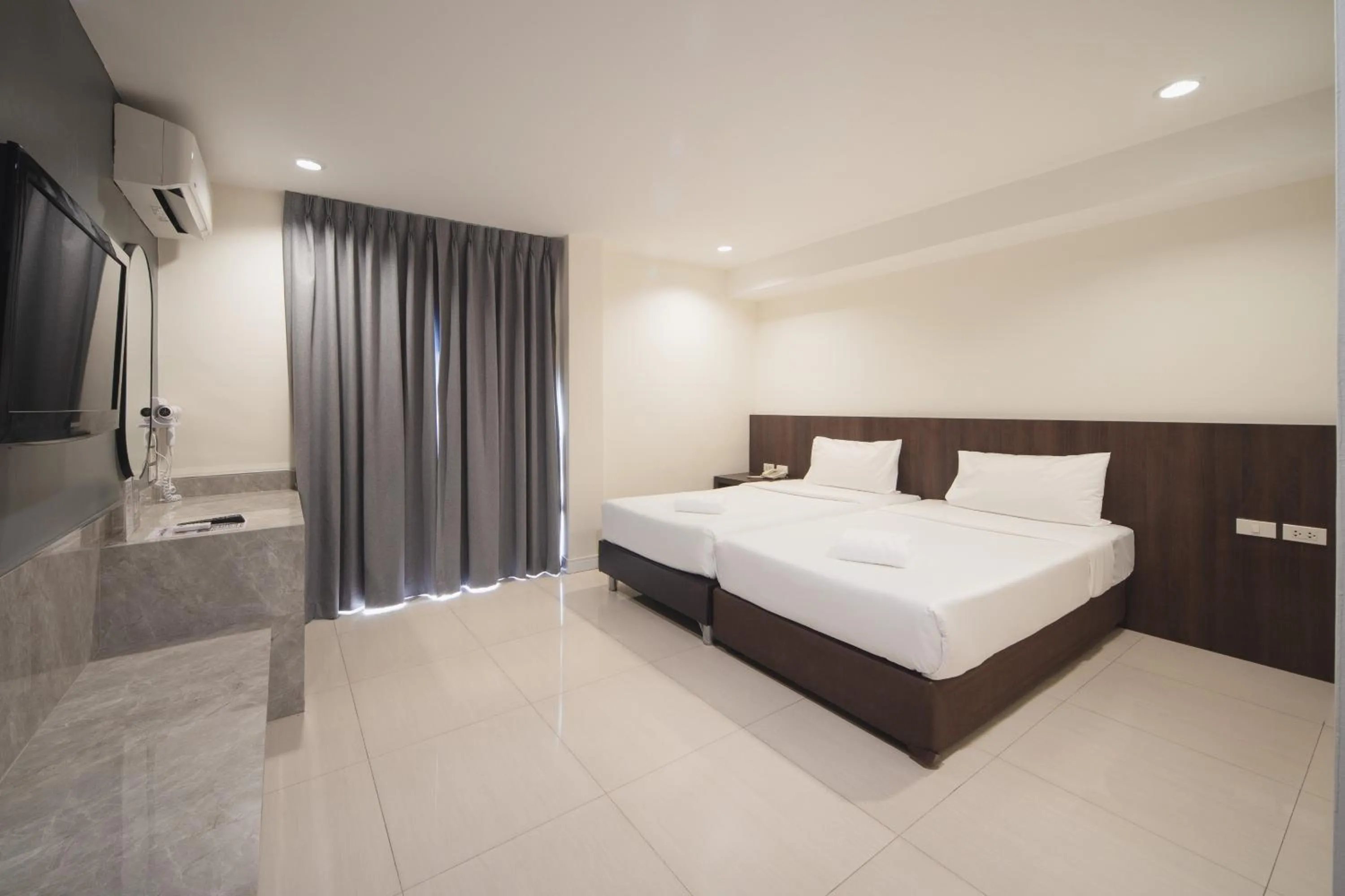 Bed in Grand Alpine Hotel