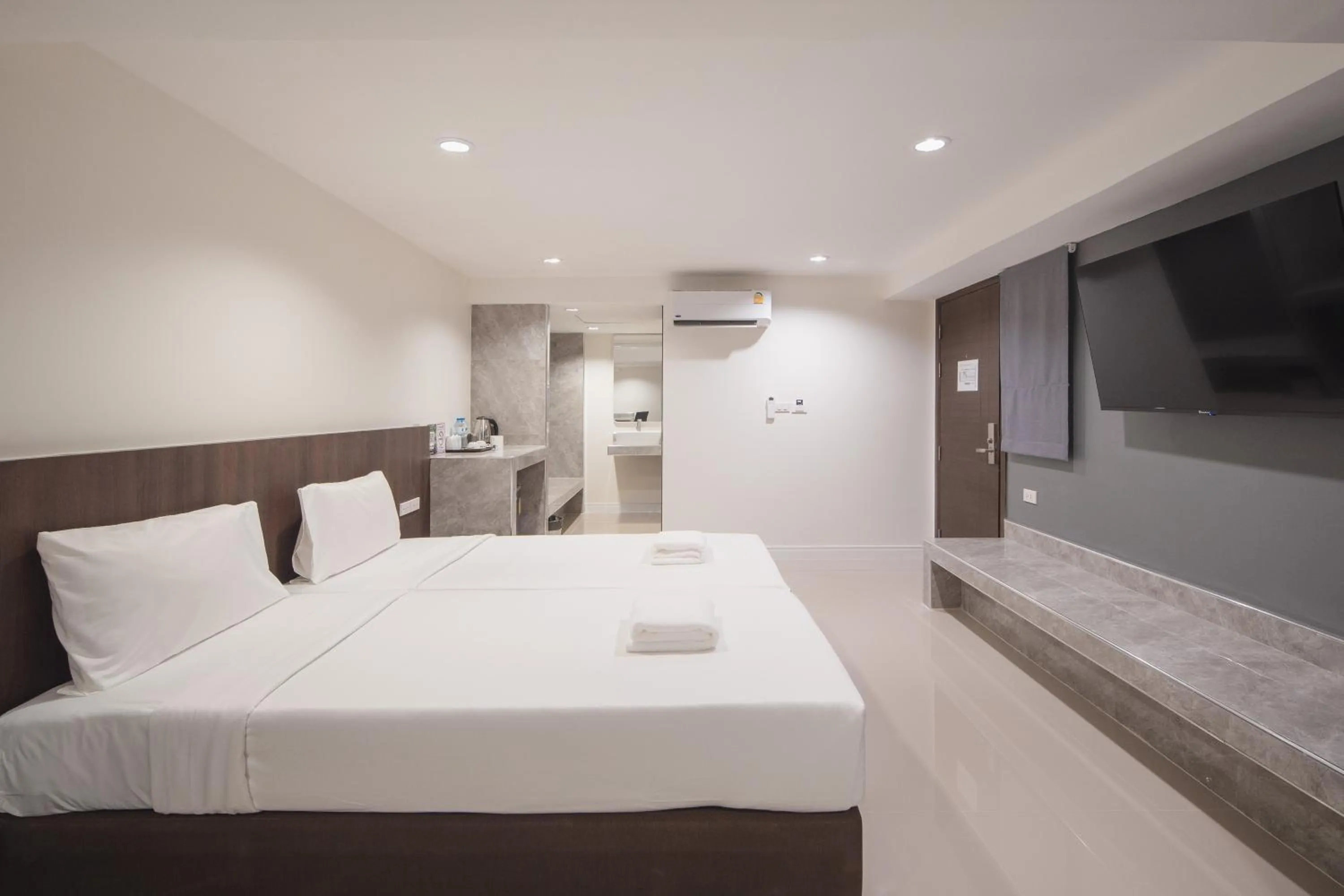 Bed in Grand Alpine Hotel