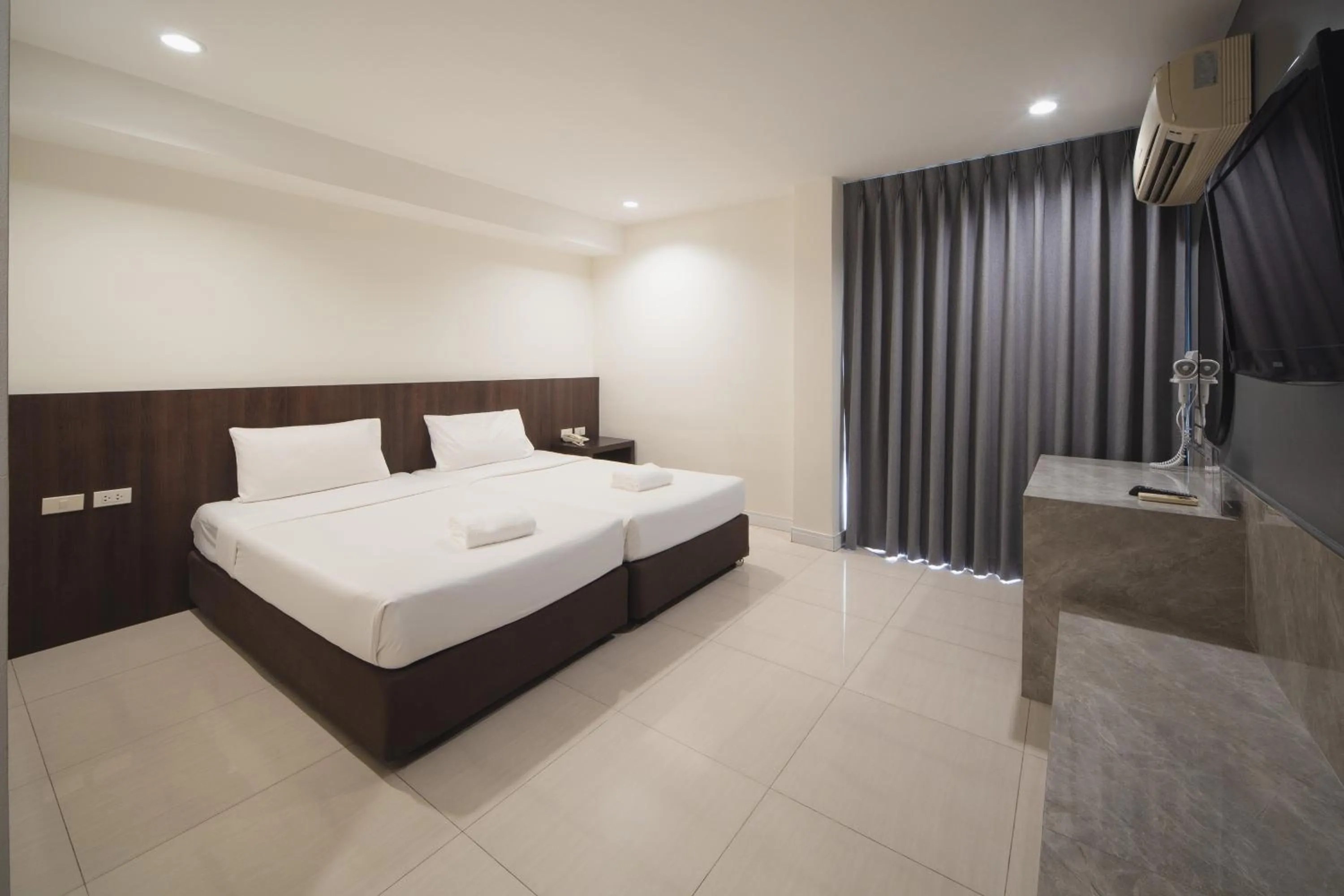 Bed in Grand Alpine Hotel