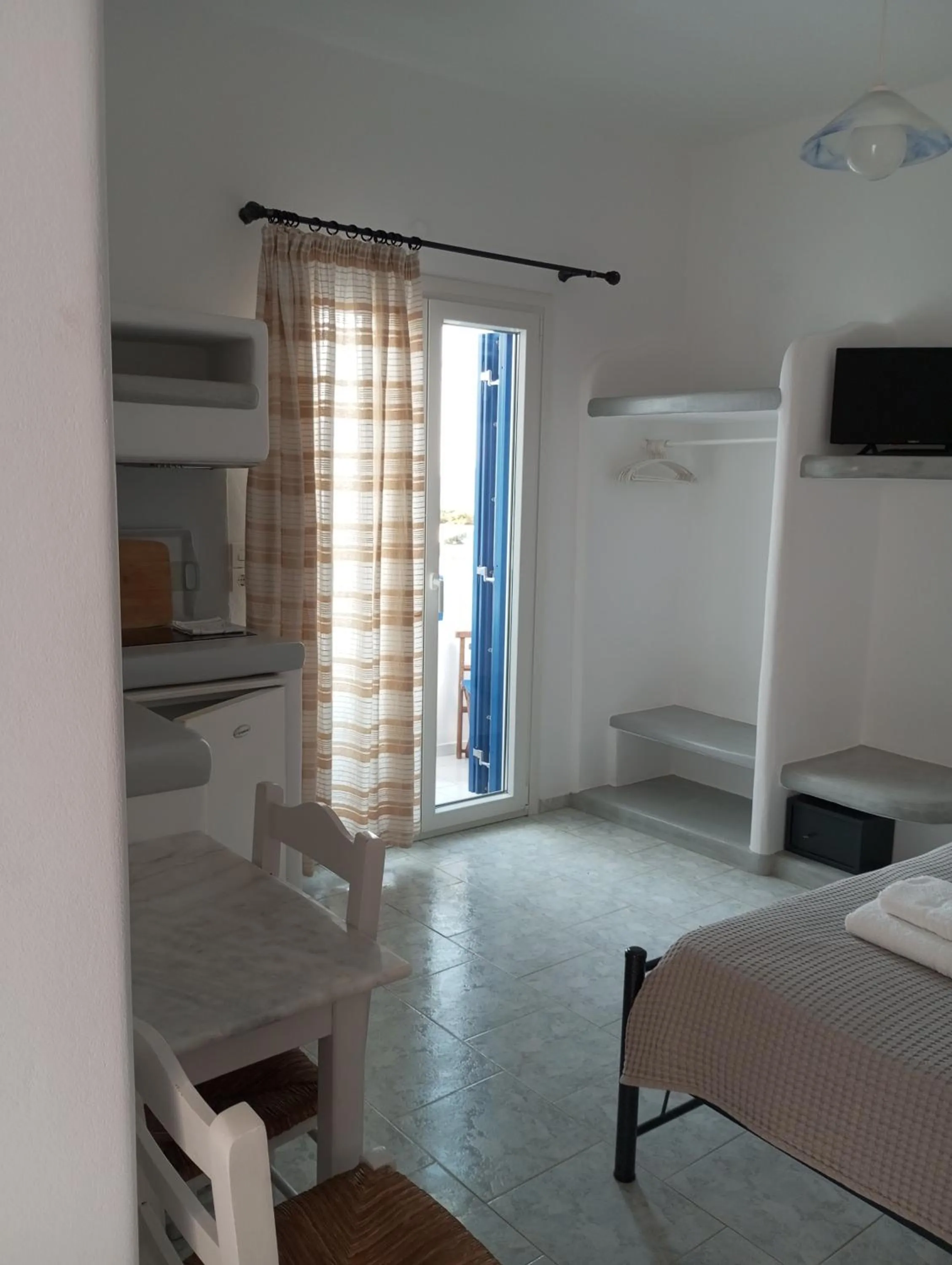 Photo of the whole room, Bed in Captain Stavros Milos