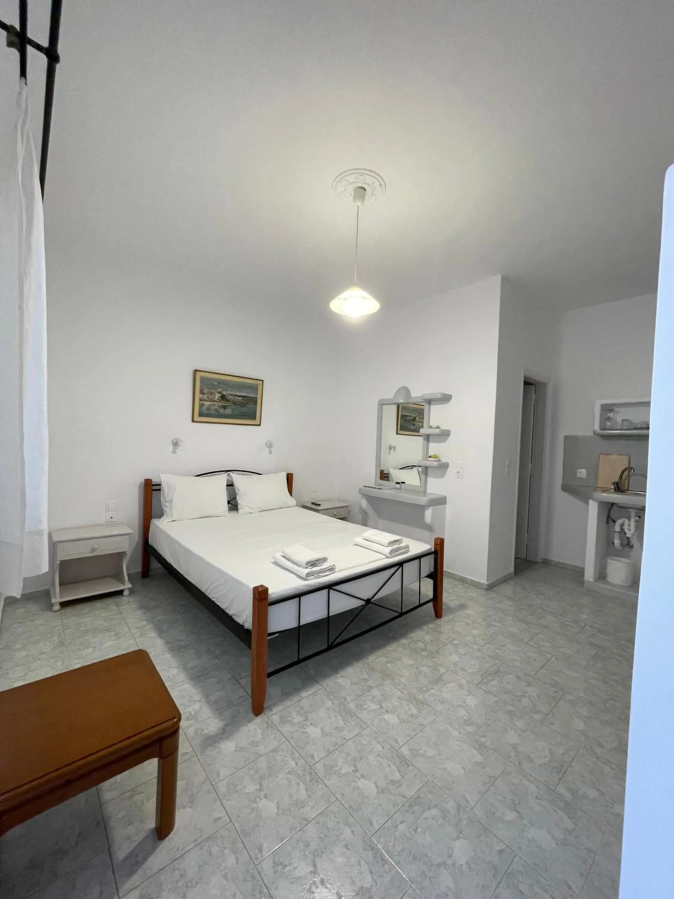 Photo of the whole room, Bed in Captain Stavros Milos