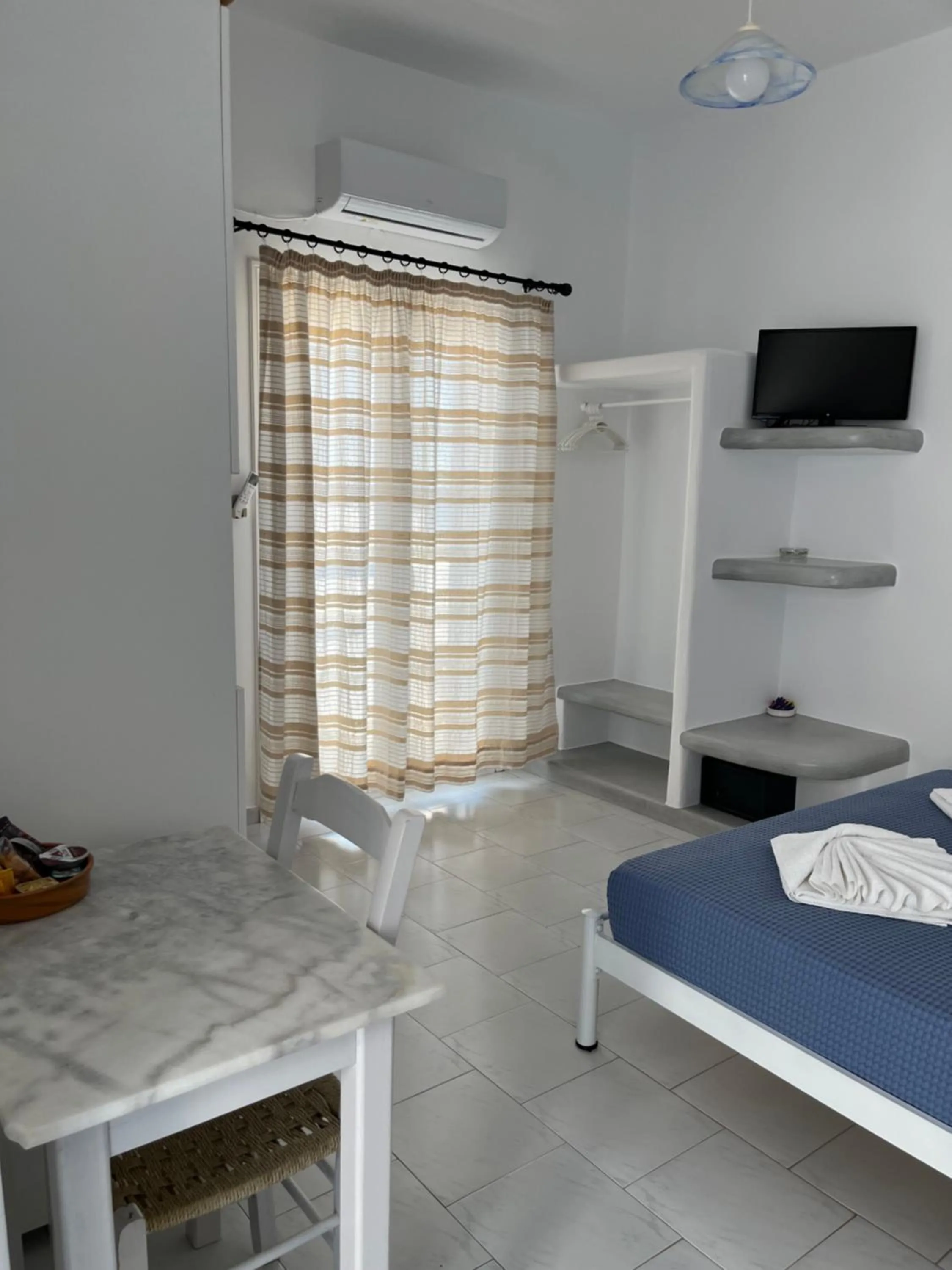 Photo of the whole room, Bed in Captain Stavros Milos