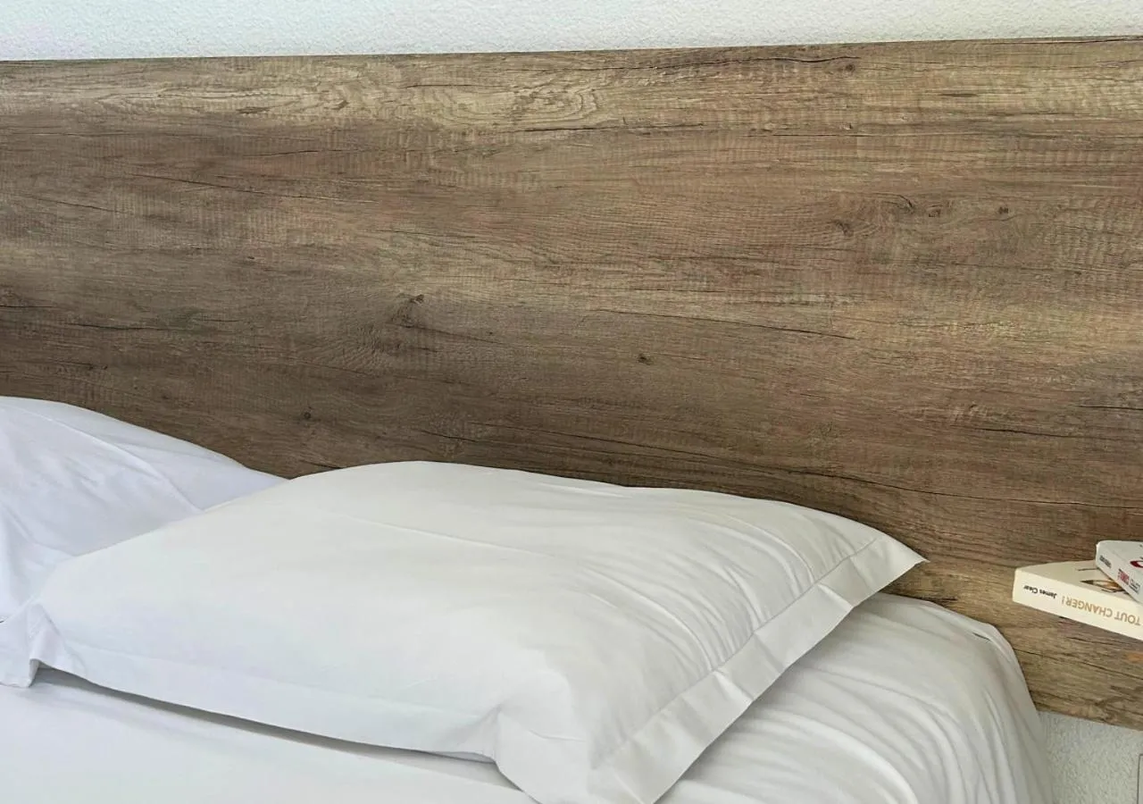 Bed in Hôtel Le Carnon