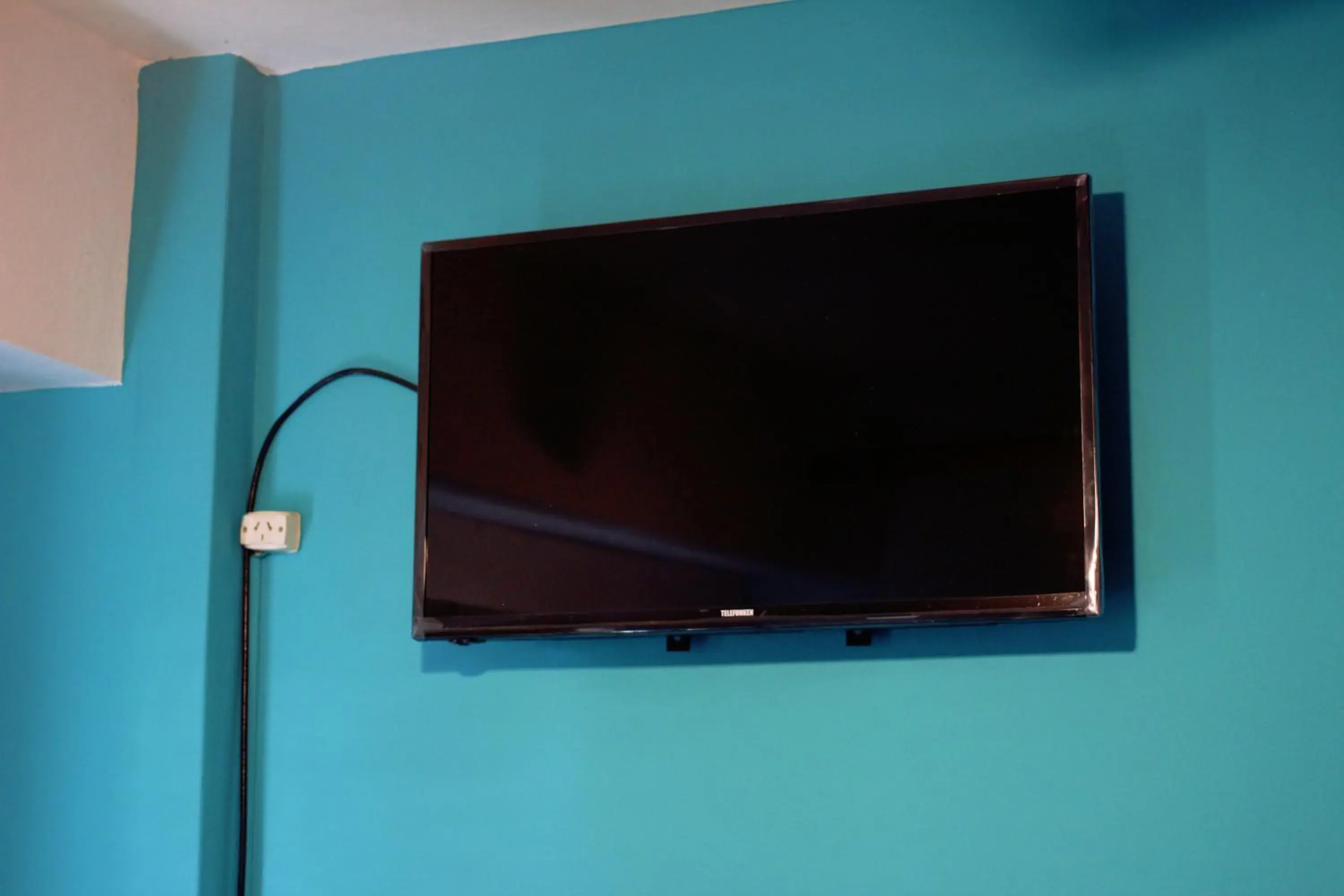 TV and multimedia, TV/Entertainment Center in Link Cordoba Hostel