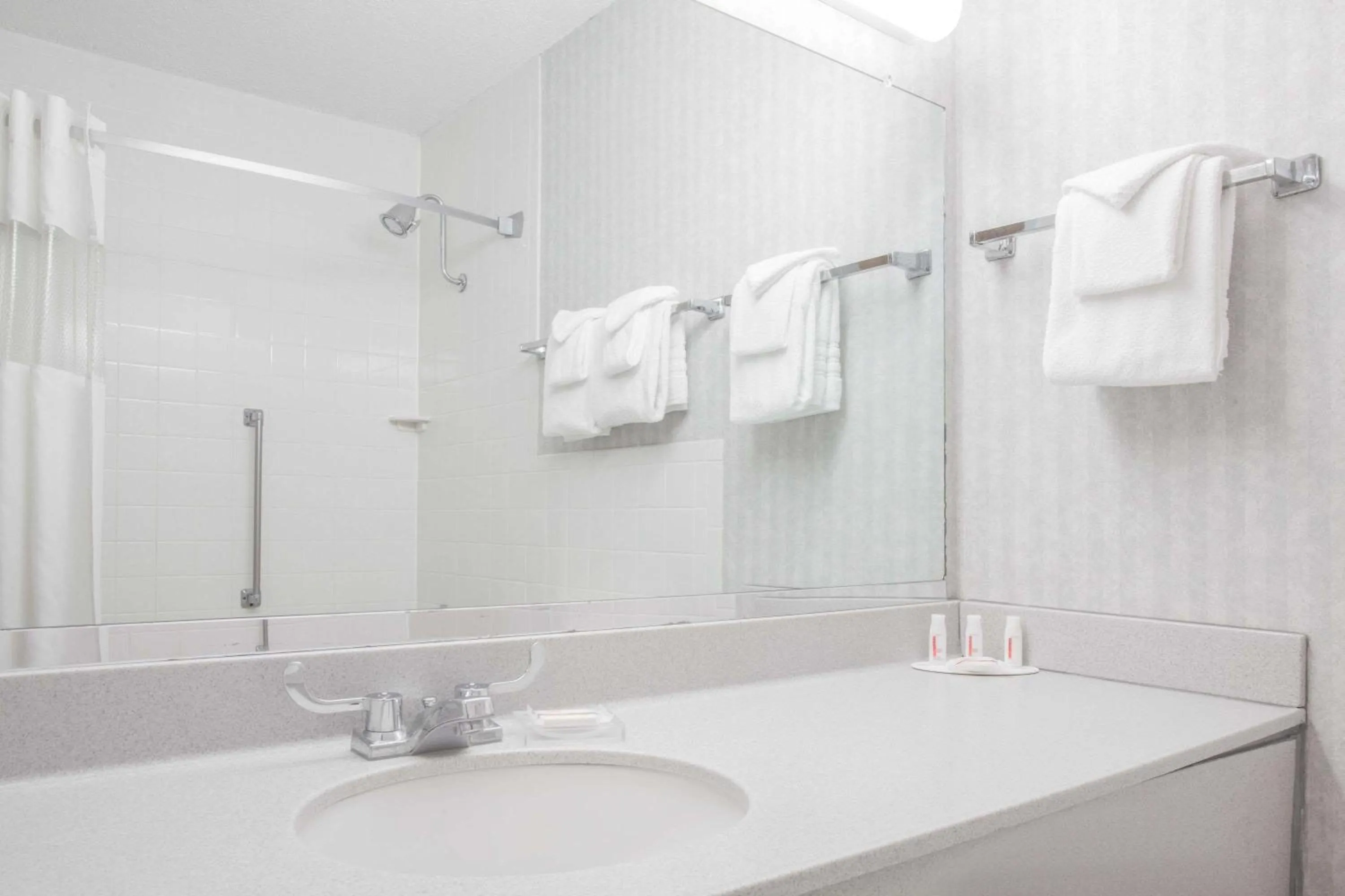 Bathroom in Ramada by Wyndham Angola/Fremont Area