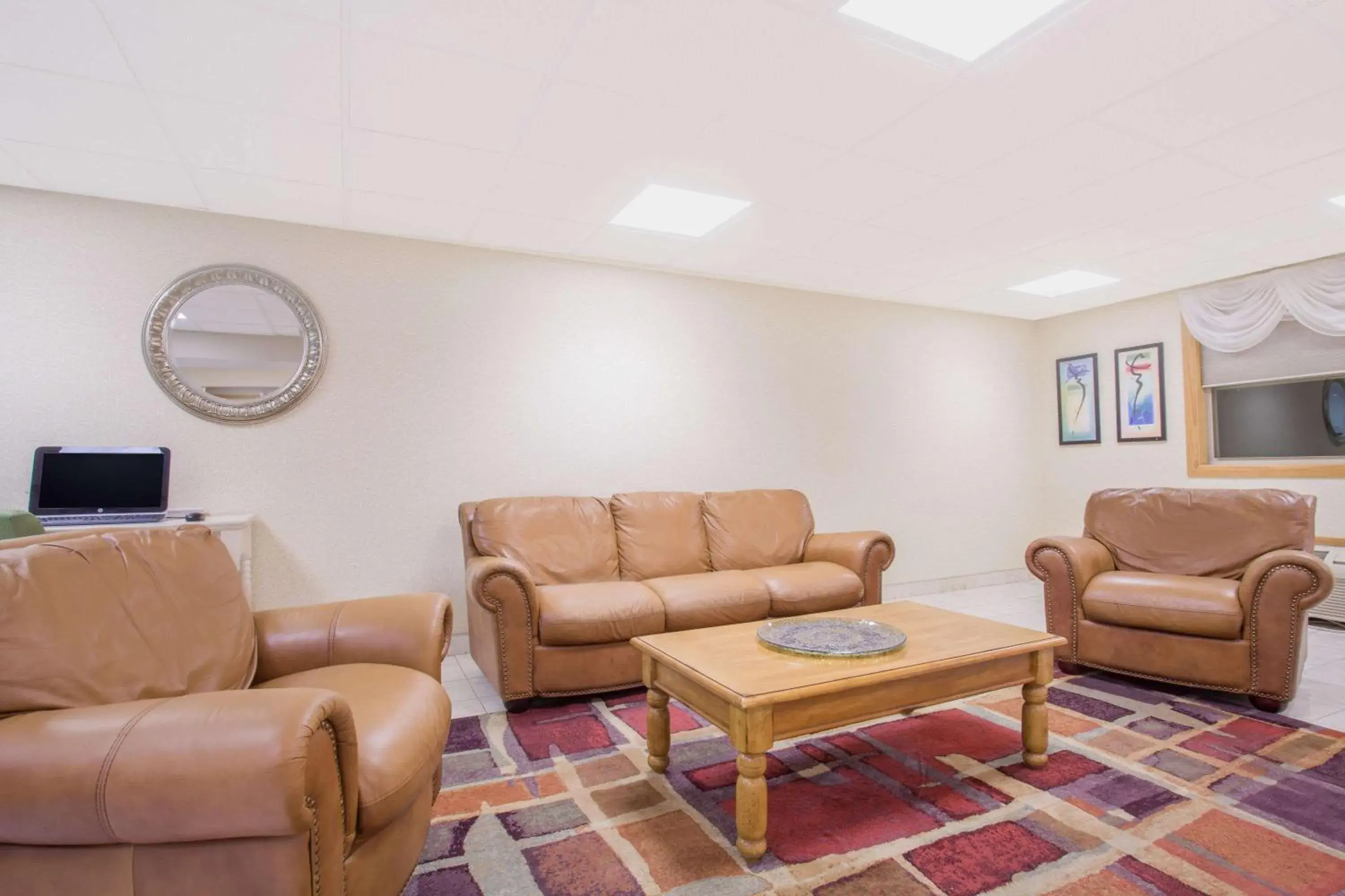 Lobby or reception in Ramada by Wyndham Angola/Fremont Area Lobby or reception in Ramada by Wyndham Angola/Fremont Area