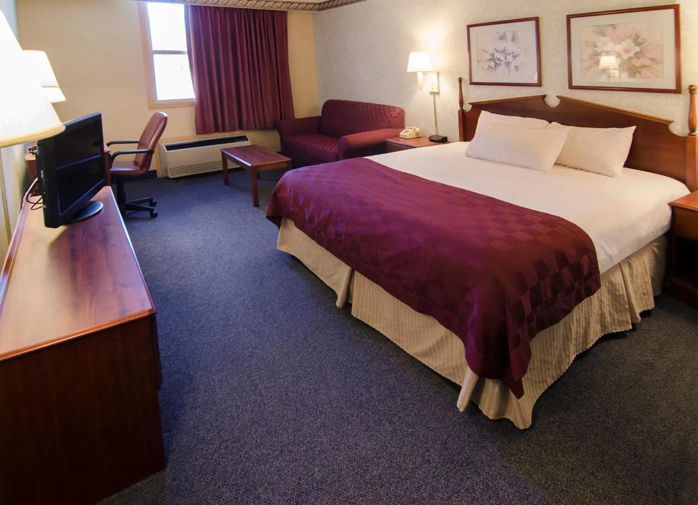 Bedroom, Bed in Ramada by Wyndham Angola/Fremont Area Bedroom, Bed in Ramada by Wyndham Angola/Fremont Area