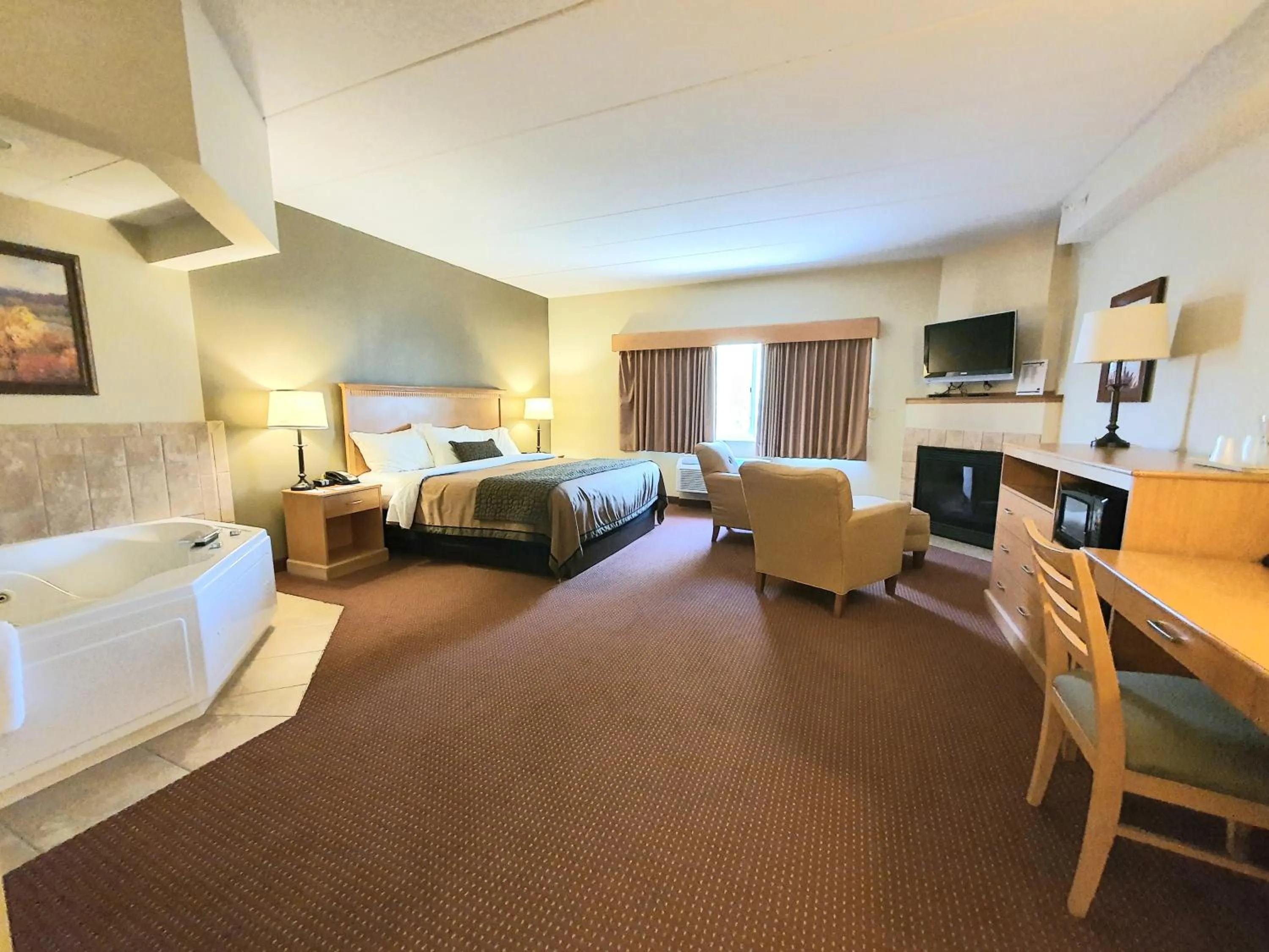 Bed in AmeriVu Inn and Suites - Waconia