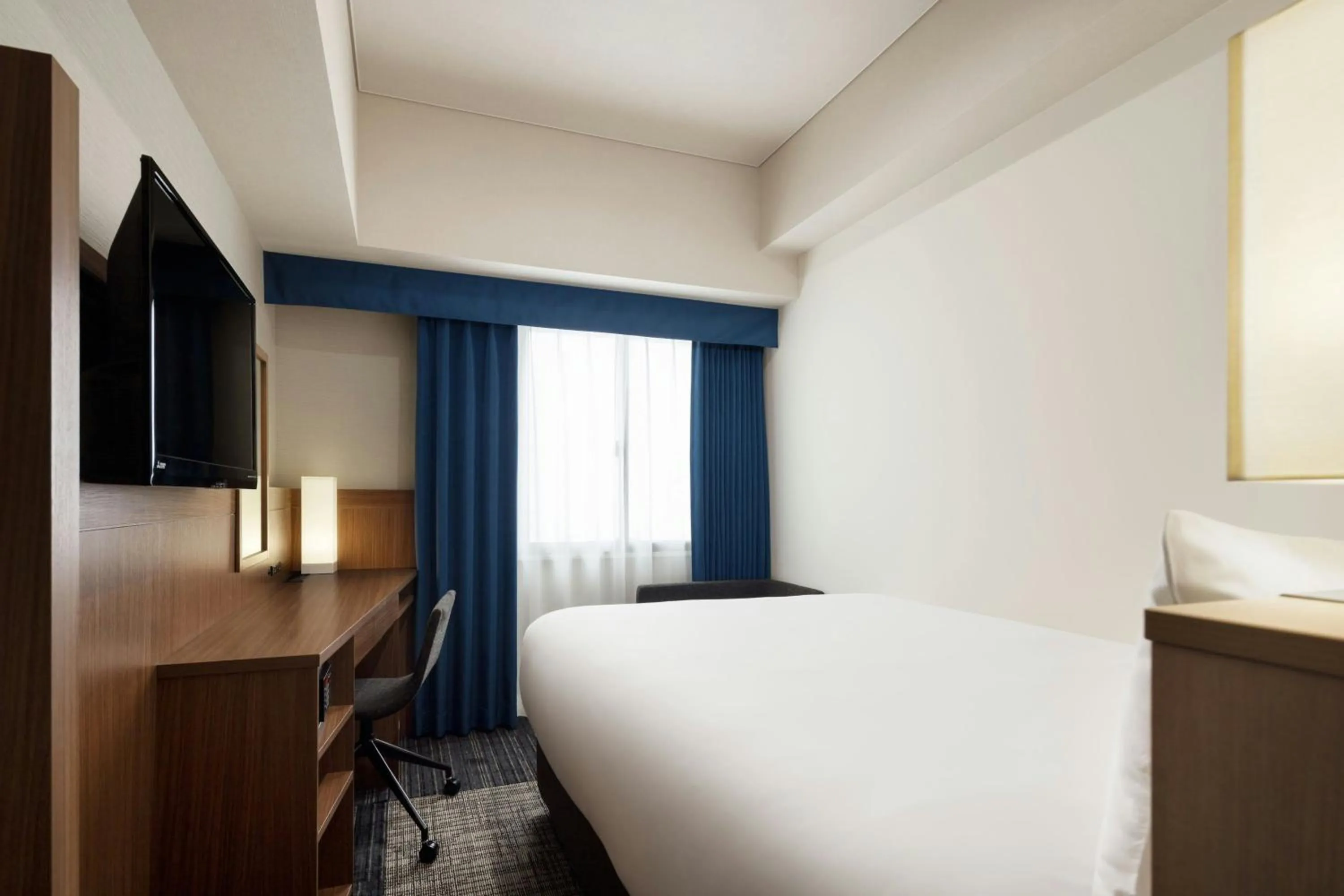 Photo of the whole room, Bed in Four Points Flex by Sheraton Yokohama West