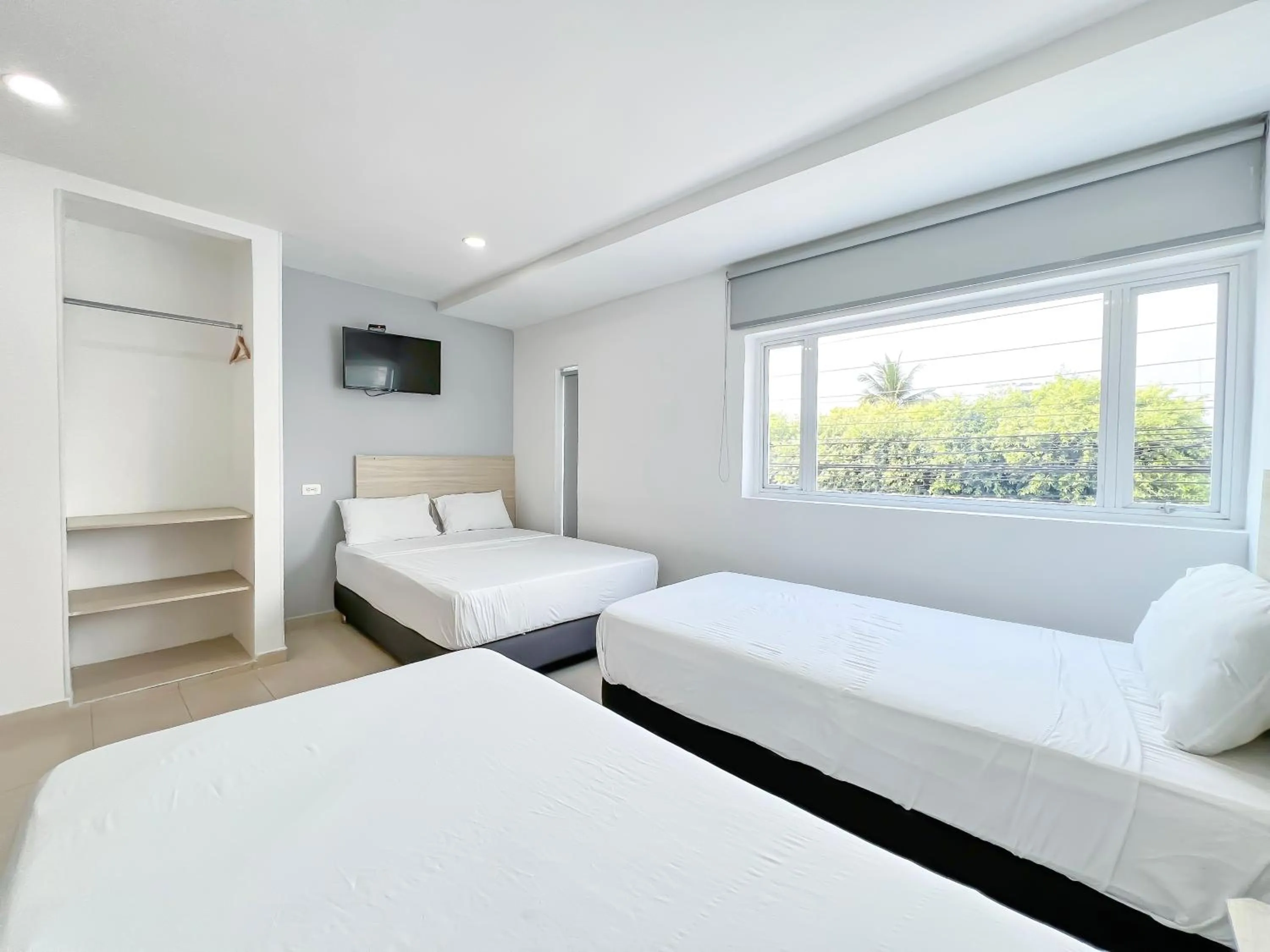 TV and multimedia, Bed in Stanza Hotel Monteria