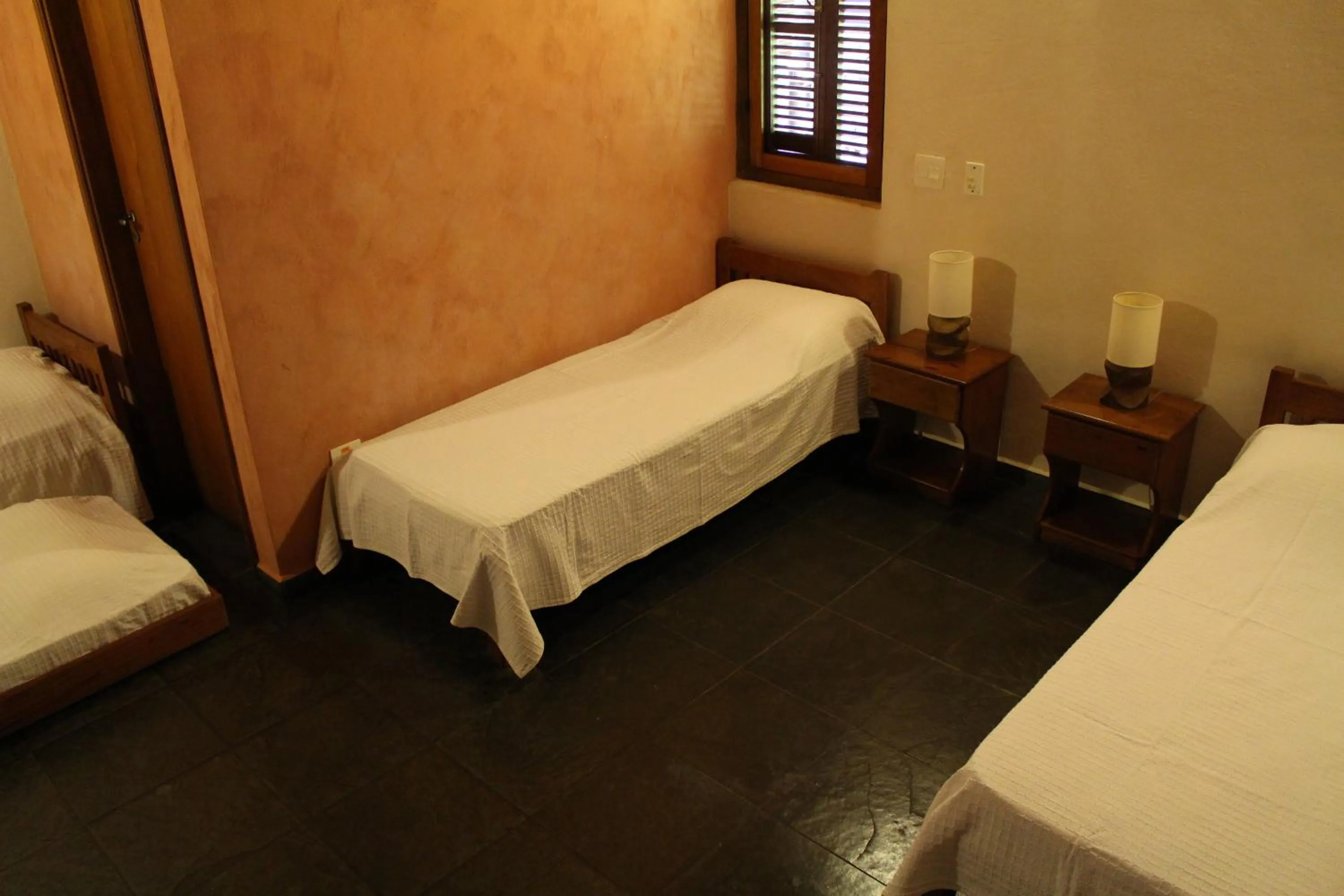 Bed in Pousada Canto Verde