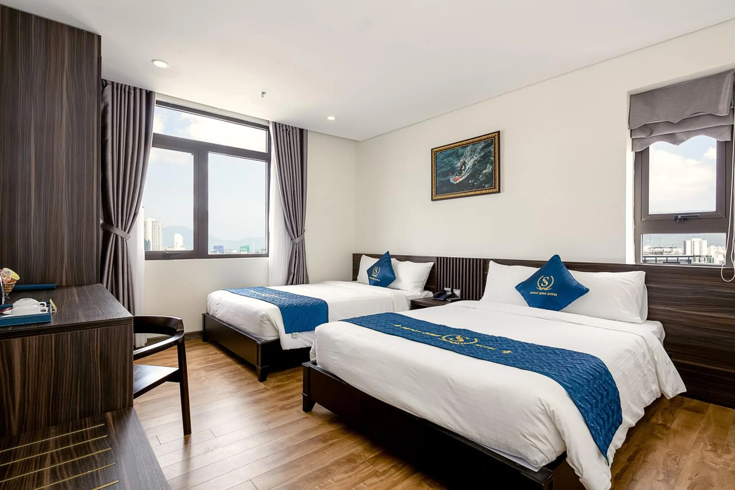 Bed in Sepon Blue Hotel