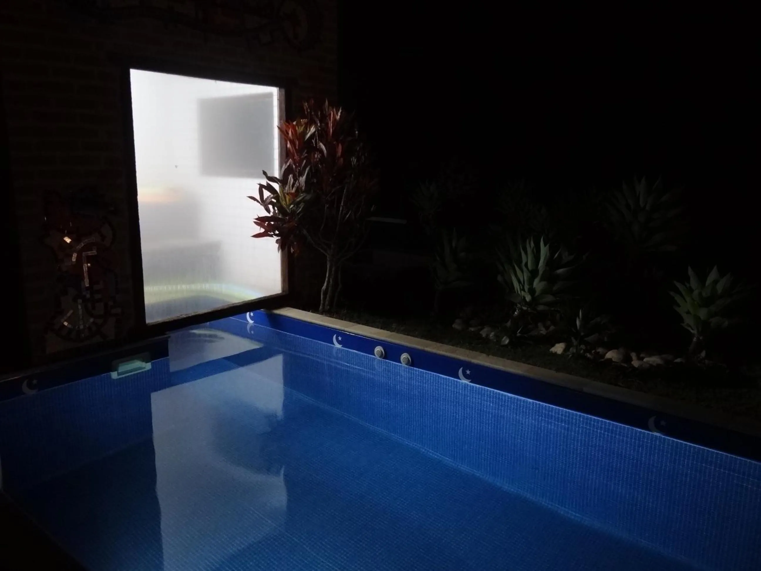 Swimming pool in Pousada Canto da Lua