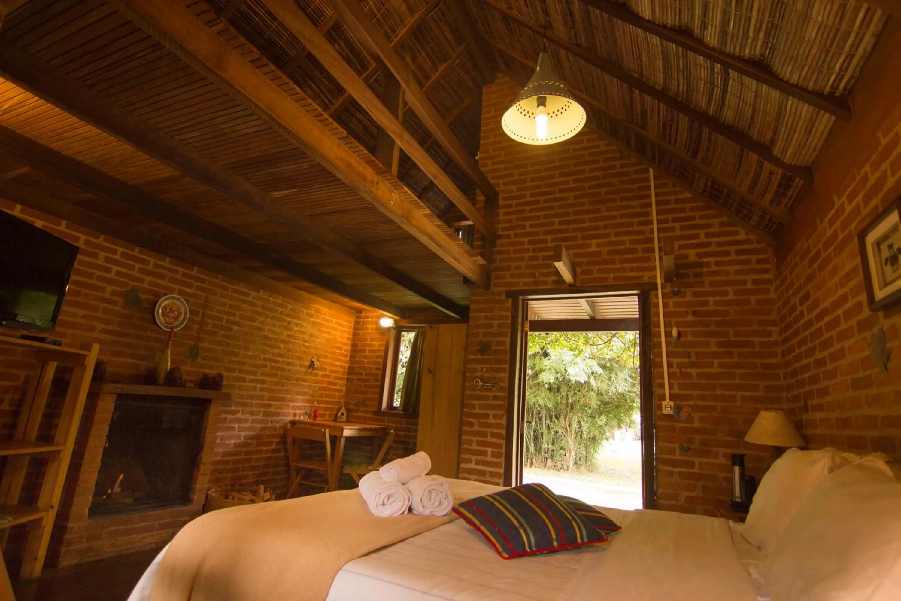 Bed in Pousada Canto da Lua