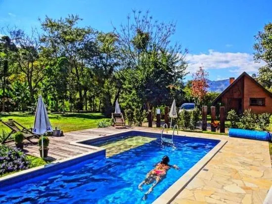 Swimming pool in Pousada Canto da Lua