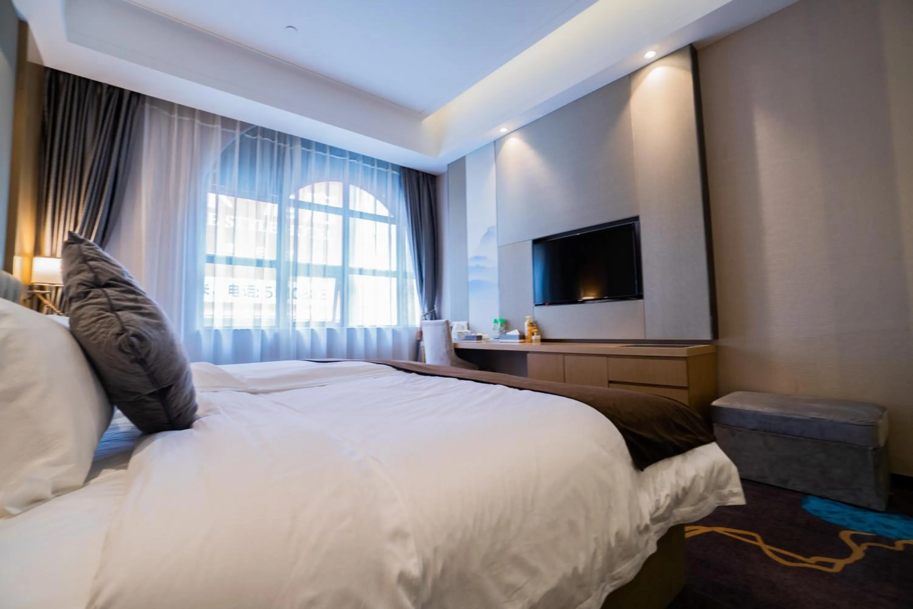 Bed in Taishan He Style Hotel
