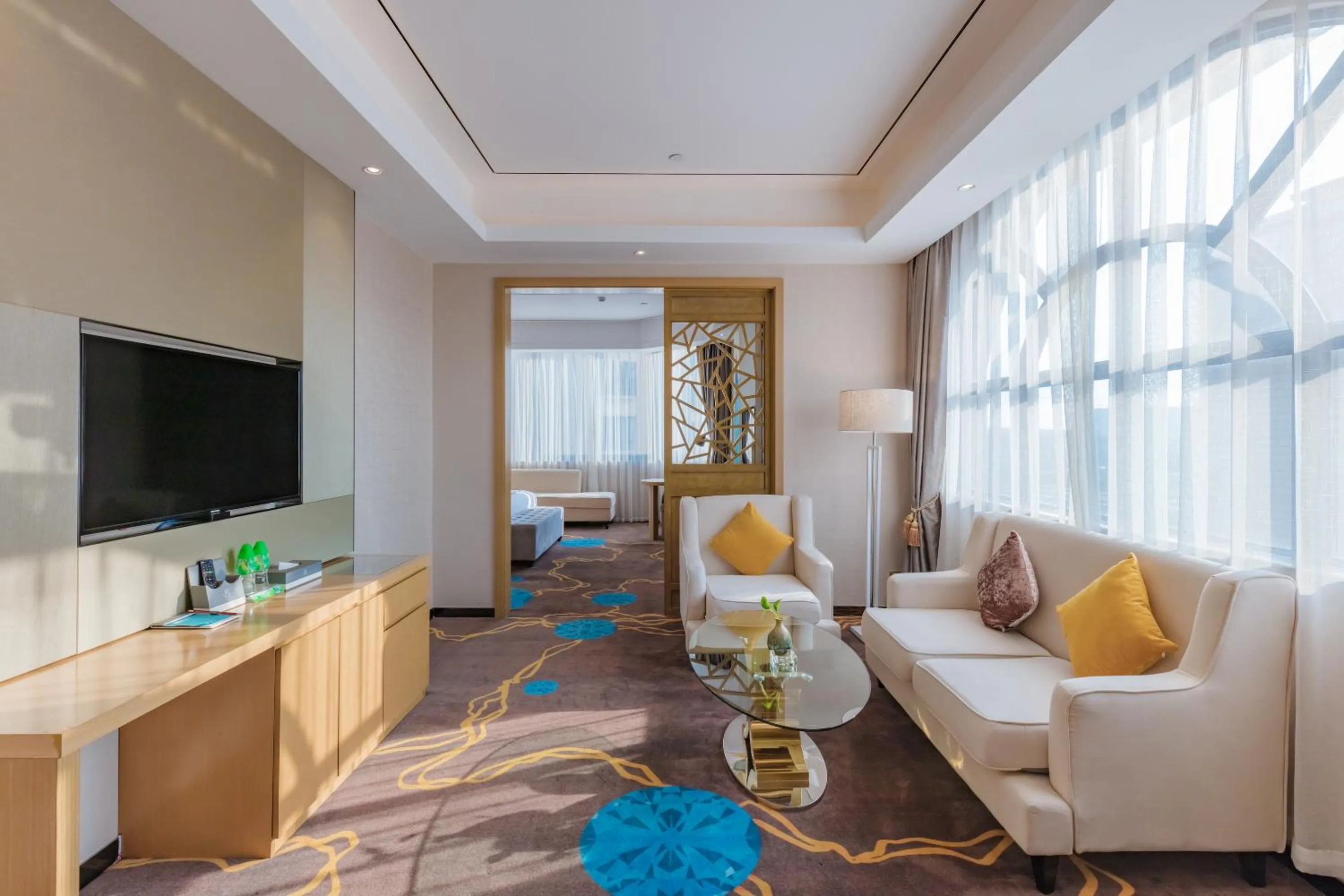 Communal lounge/ TV room in Taishan He Style Hotel