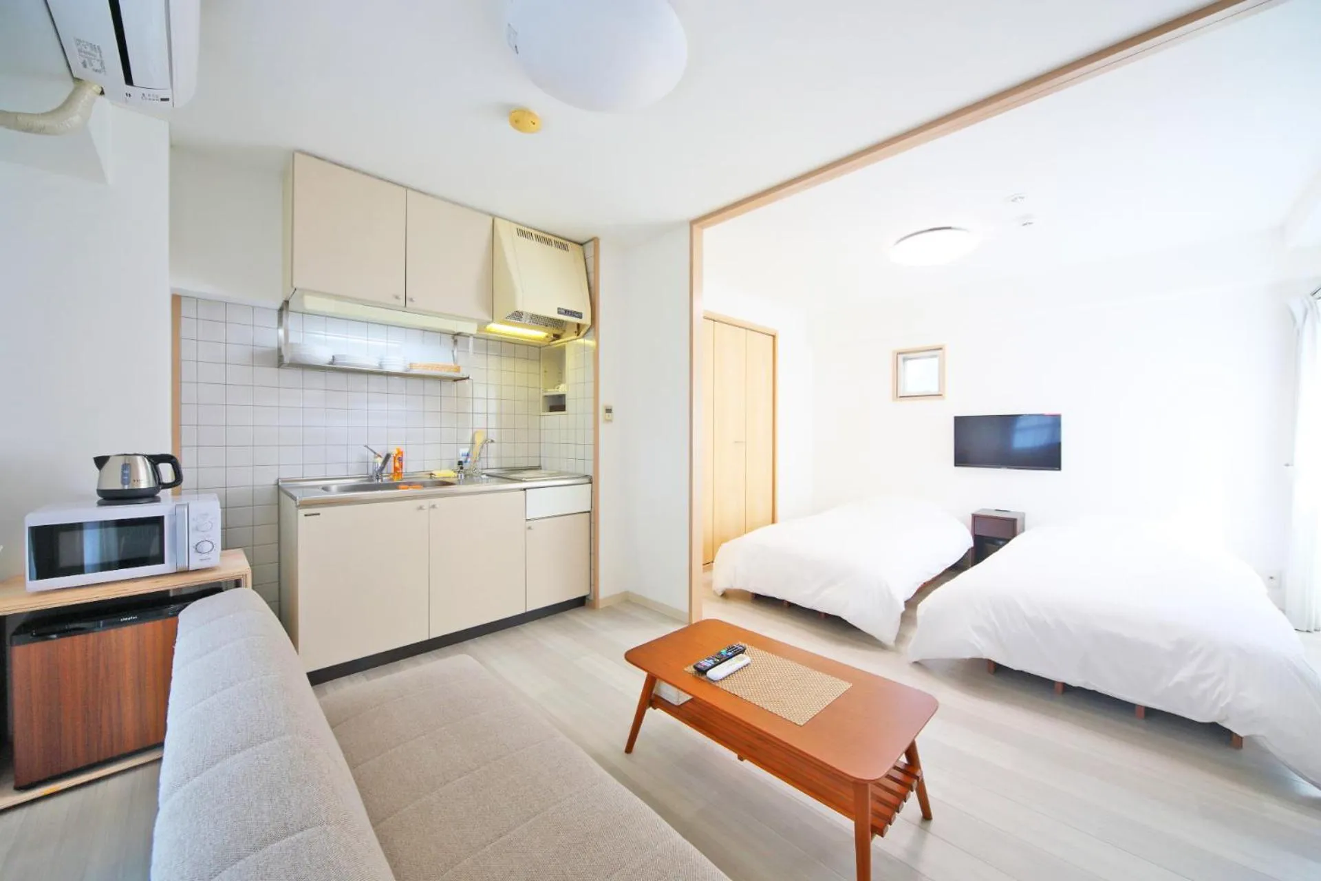 Bed in Apartment HOTEL KIRO Kyoto STATION