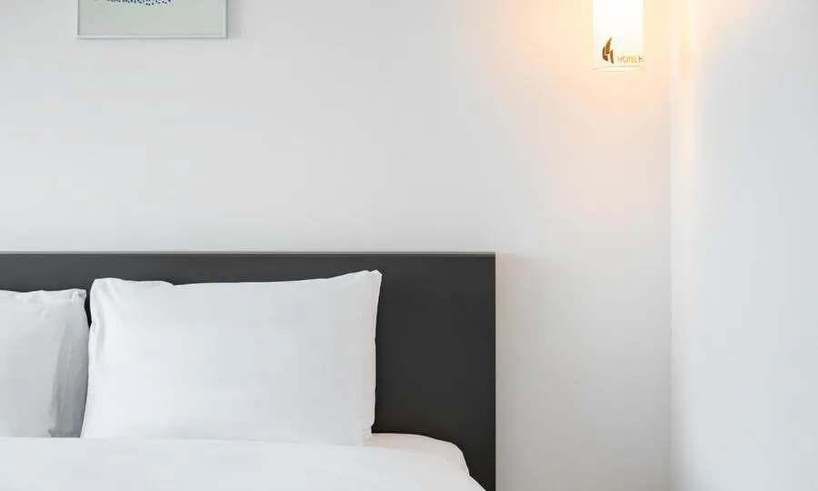 Bed in Yeosu Hotel Haven