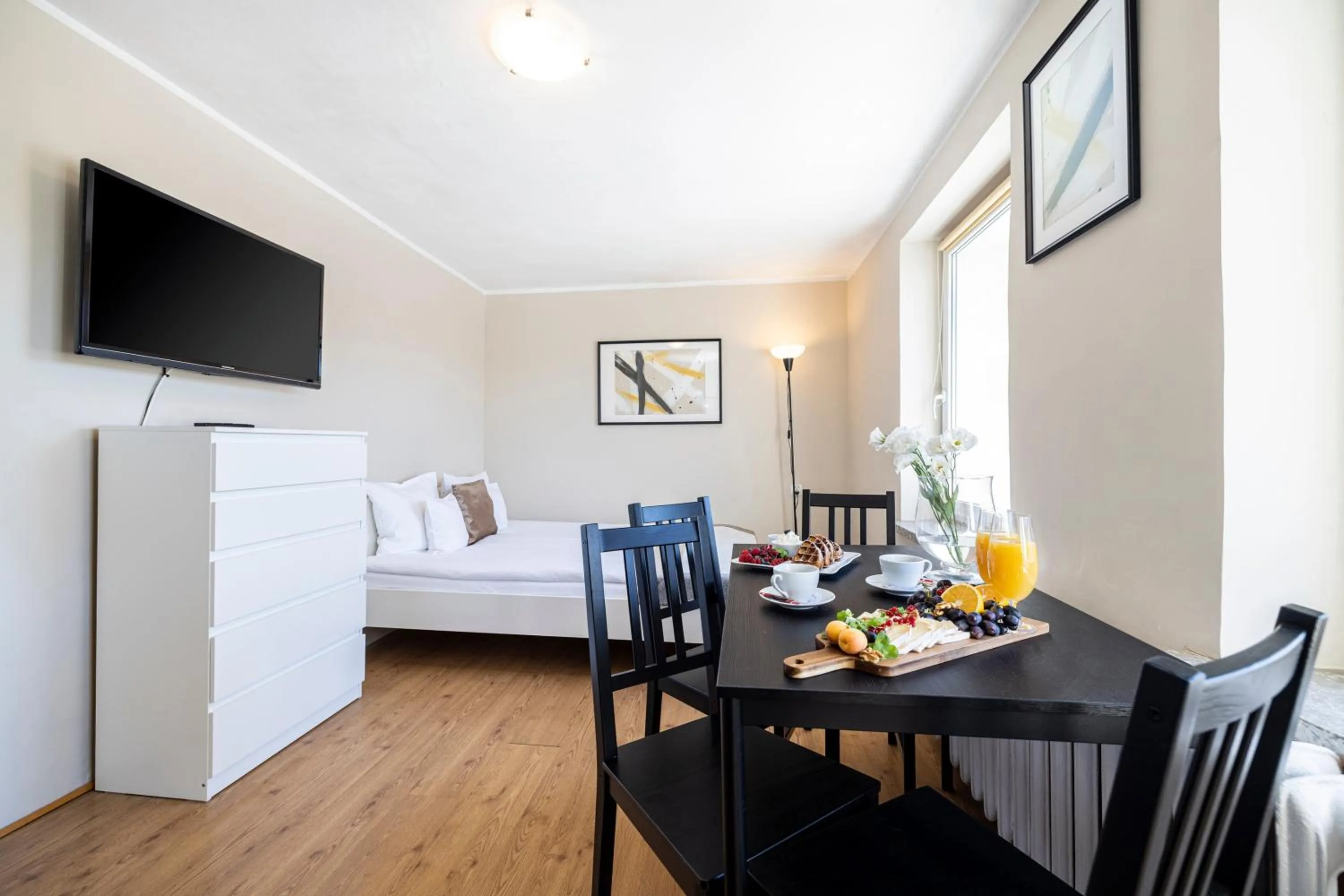 Bed in Riviera Residence Apartments