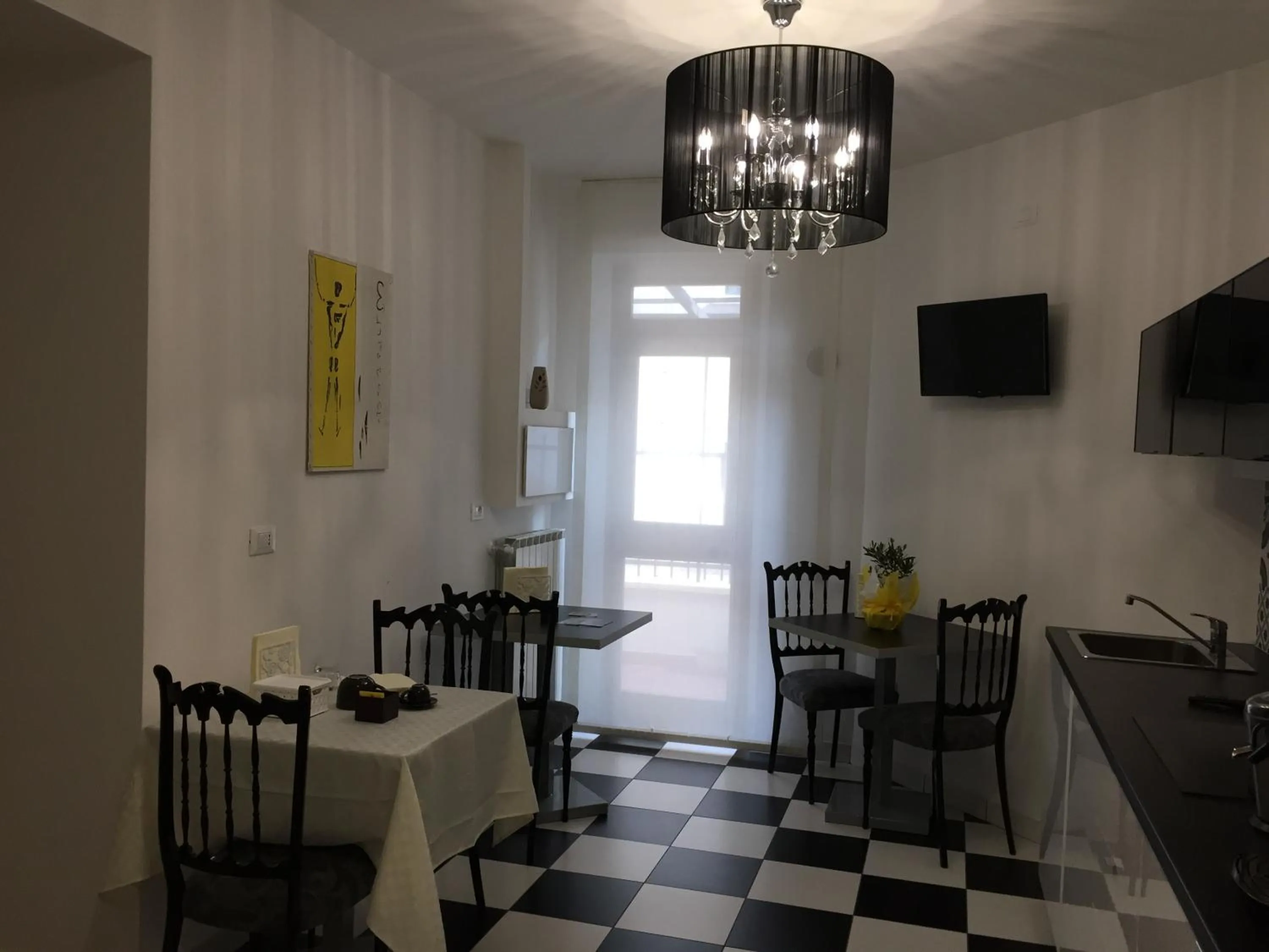 Communal lounge/ TV room in Itaka