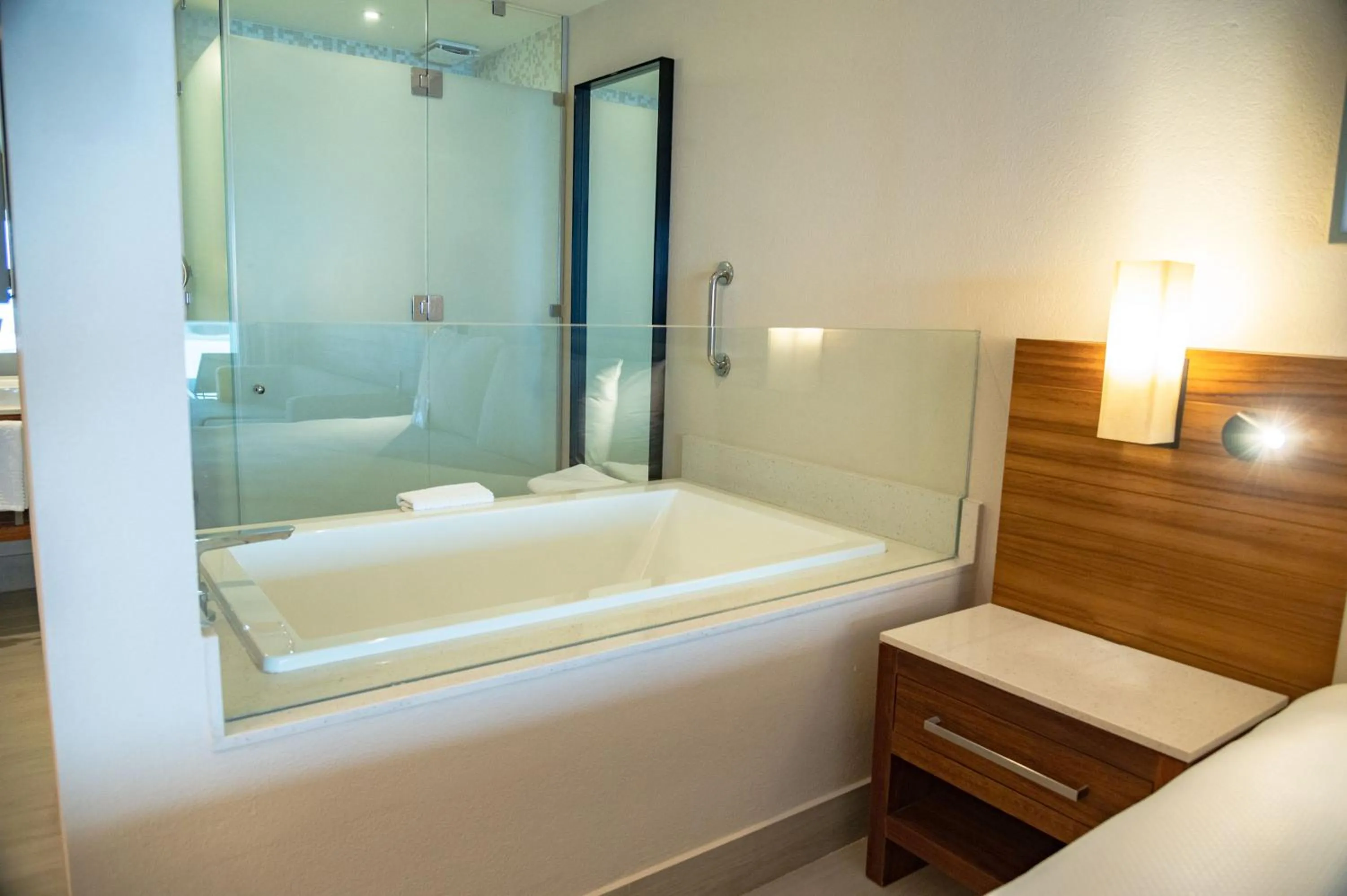 Bathroom, Bed in Emporio Cancun - Buy All Inclusive Option