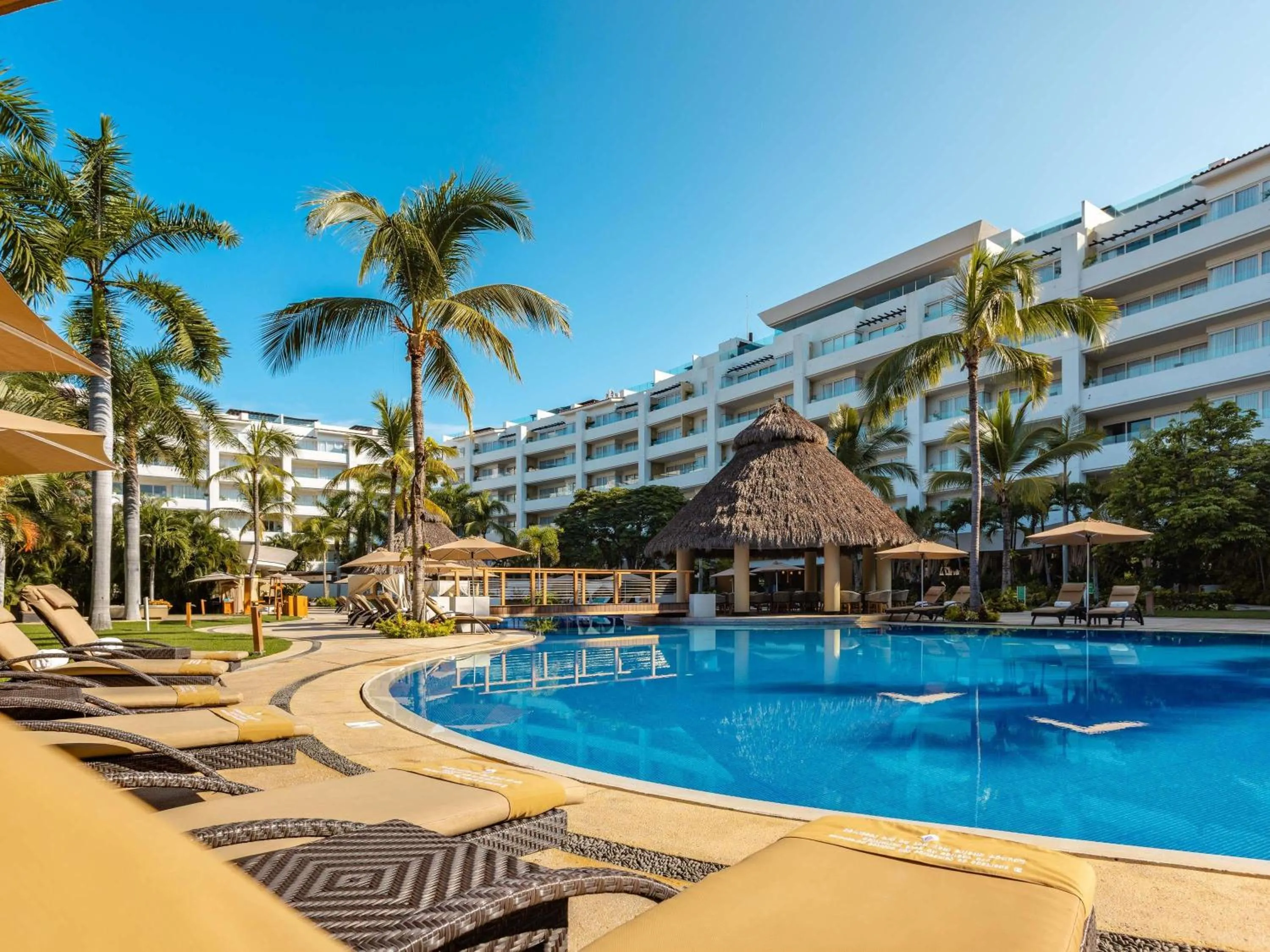 Pool view in Marival Distinct All-Suites & World Spa - Handwritten Collection