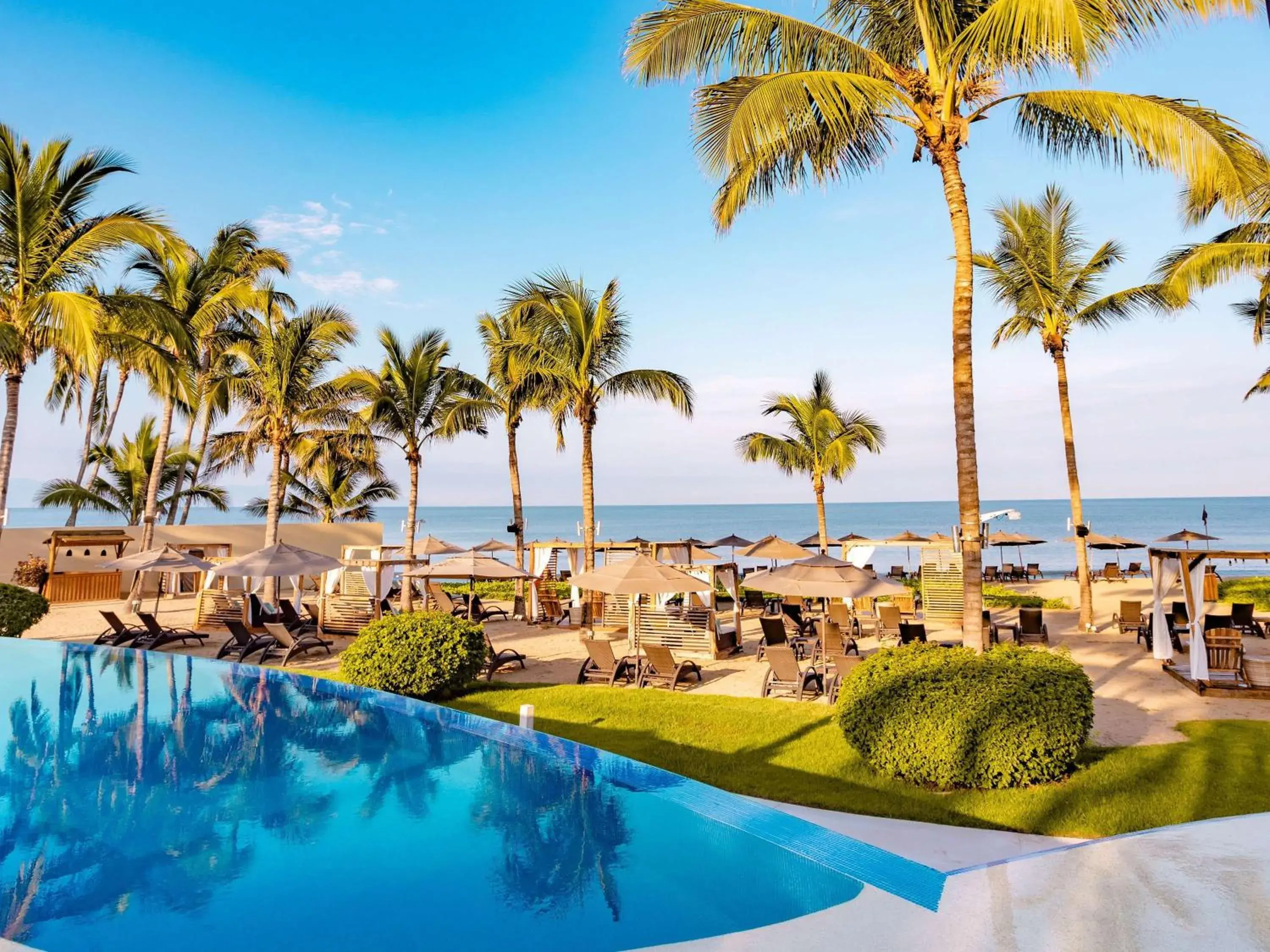 Pool view in Marival Distinct All-Suites & World Spa - Handwritten Collection Pool view in Marival Distinct All-Suites & World Spa - Handwritten Collection