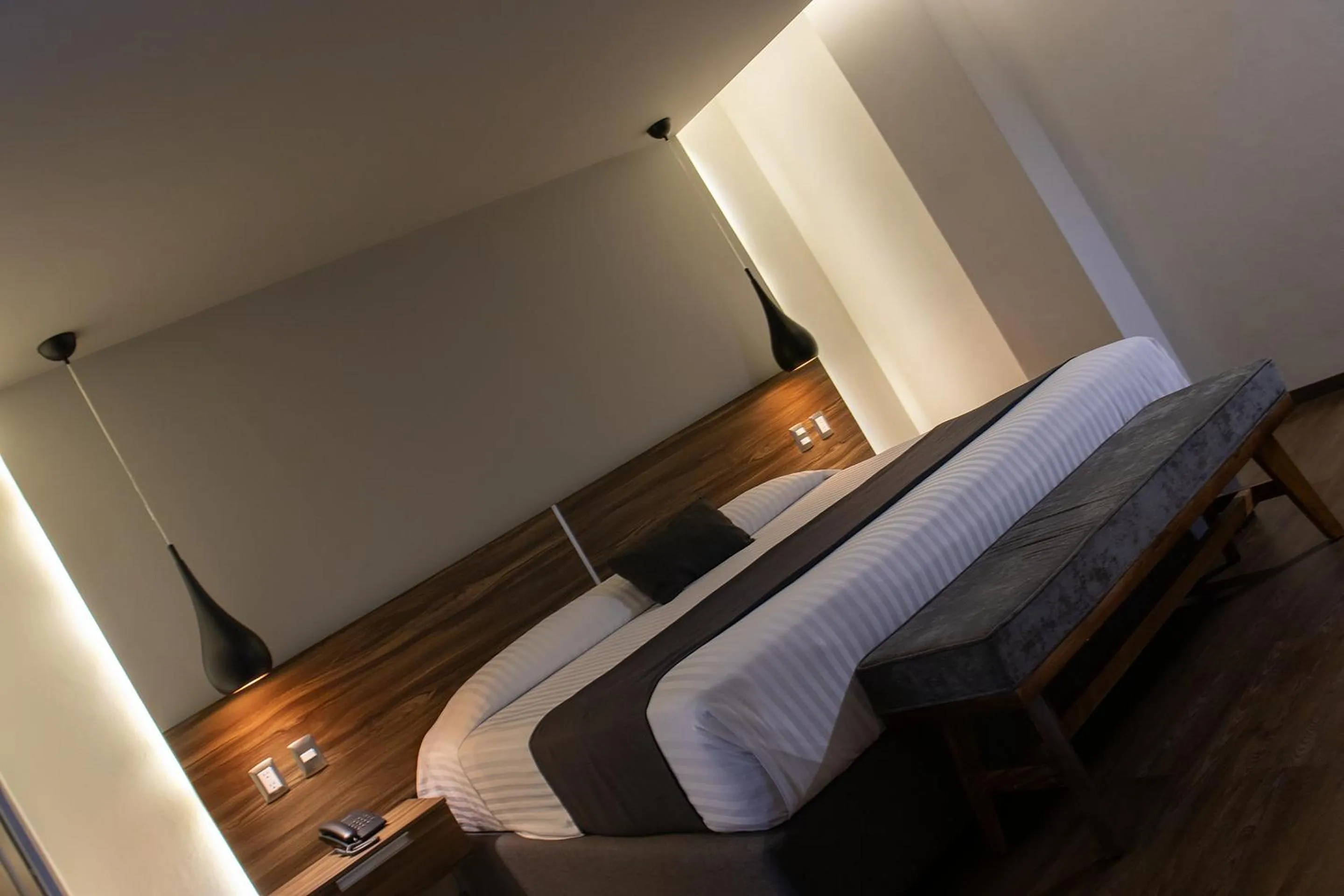 Bedroom, Bed in Estanza Hotel & Suites