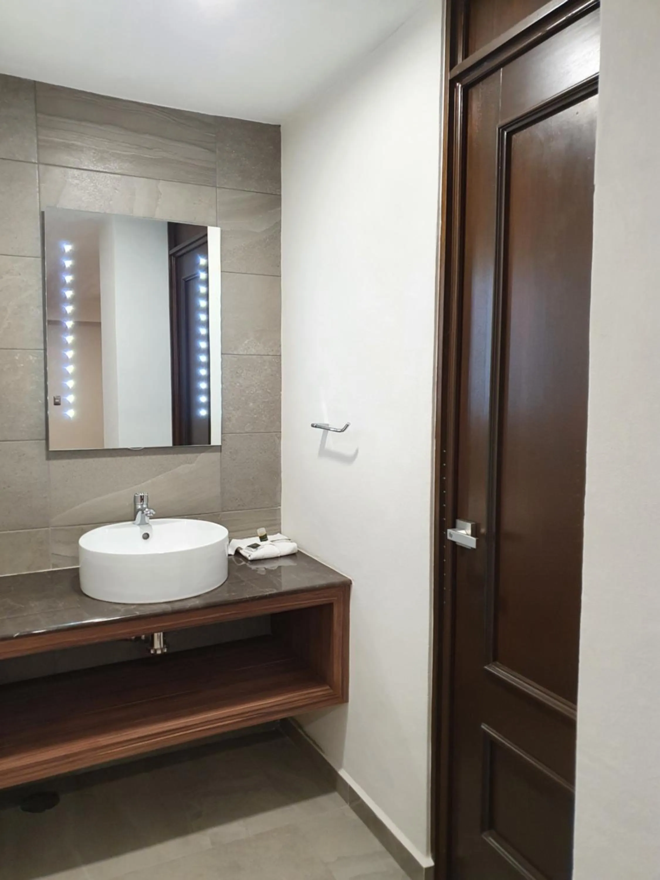 Bathroom in Estanza Hotel & Suites
