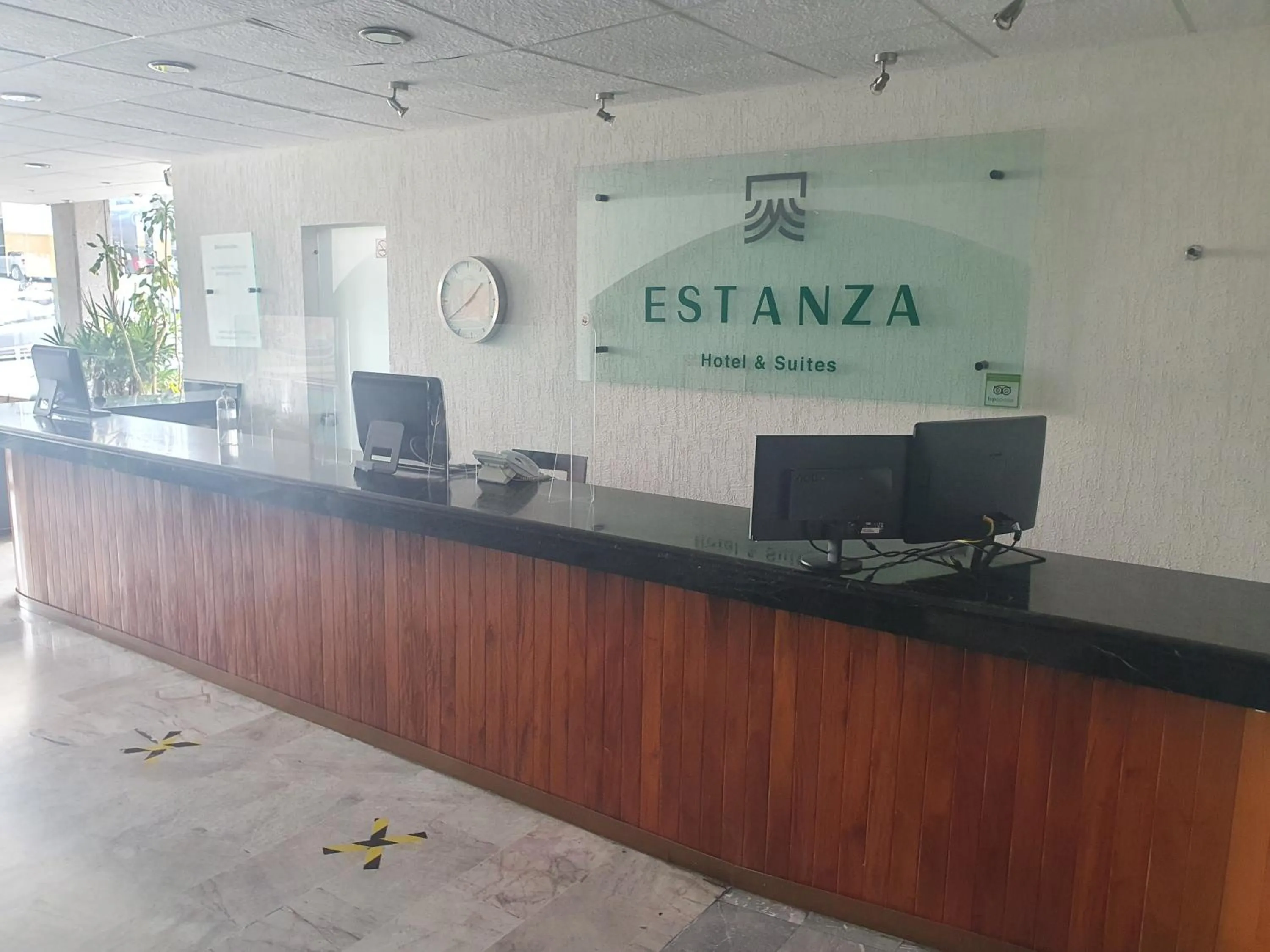 Lobby or reception in Estanza Hotel & Suites