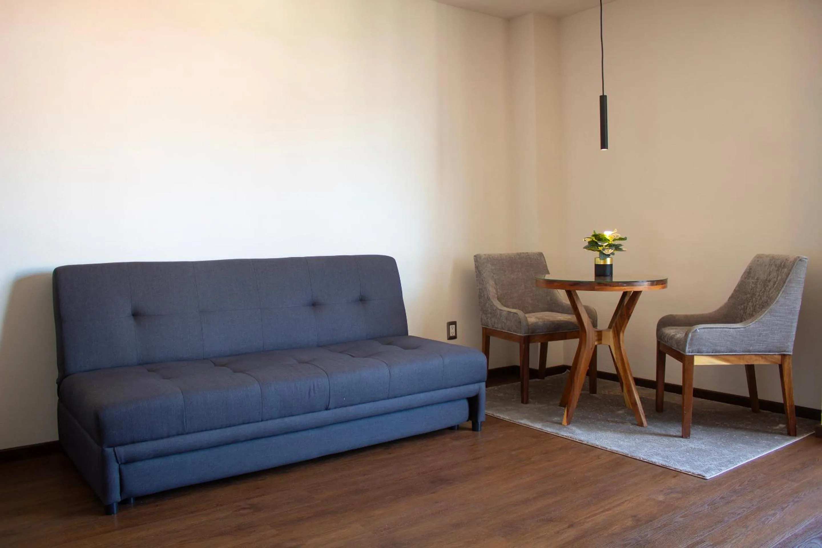 Living room in Estanza Hotel & Suites