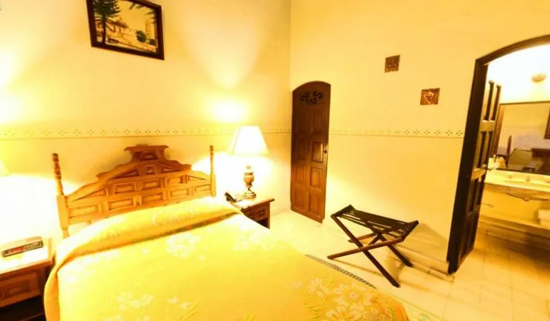 Photo of the whole room, Bed in Posada Coatepec