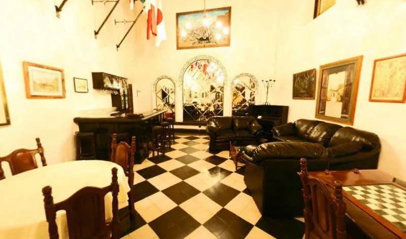 Communal lounge/ TV room in Posada Coatepec