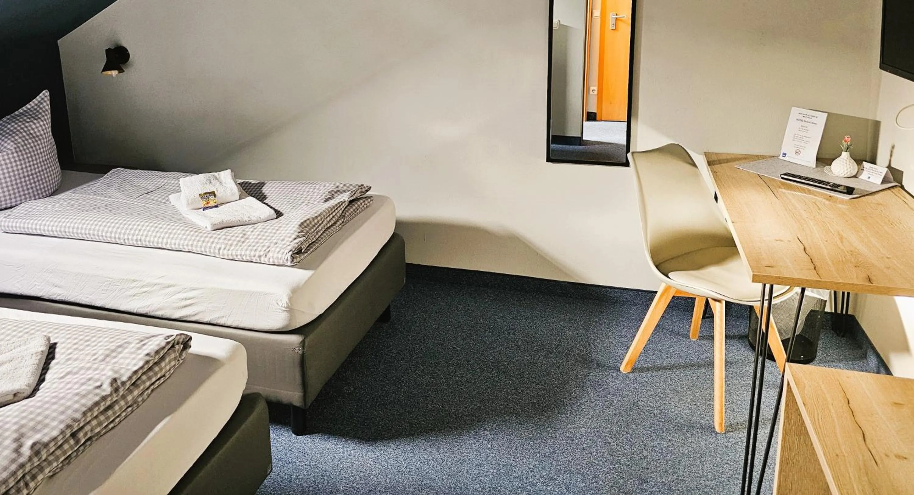 Photo of the whole room, Bed in ARRIVEL Pension Pliening - bisher Novitel