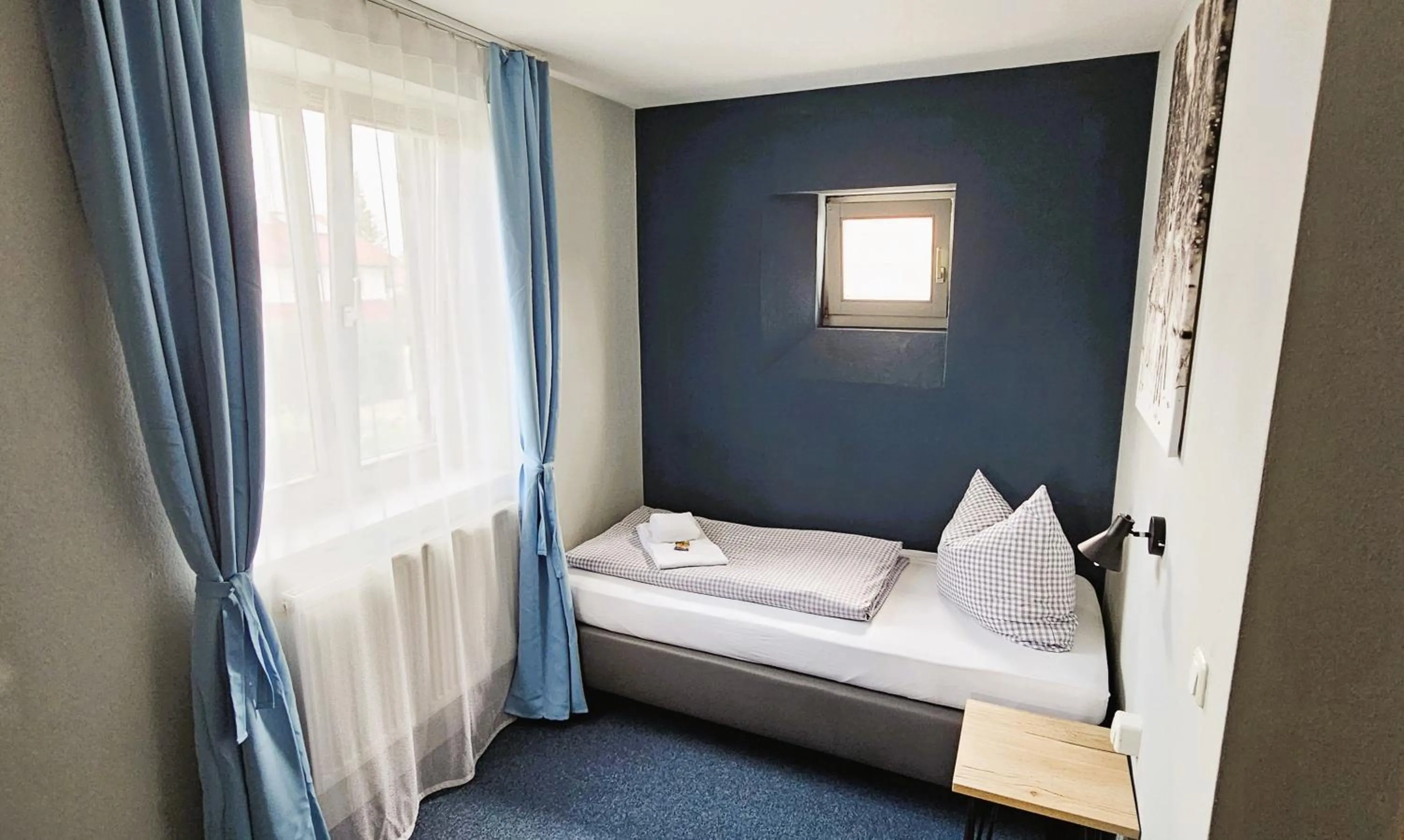 Photo of the whole room, Bed in ARRIVEL Pension Pliening - bisher Novitel