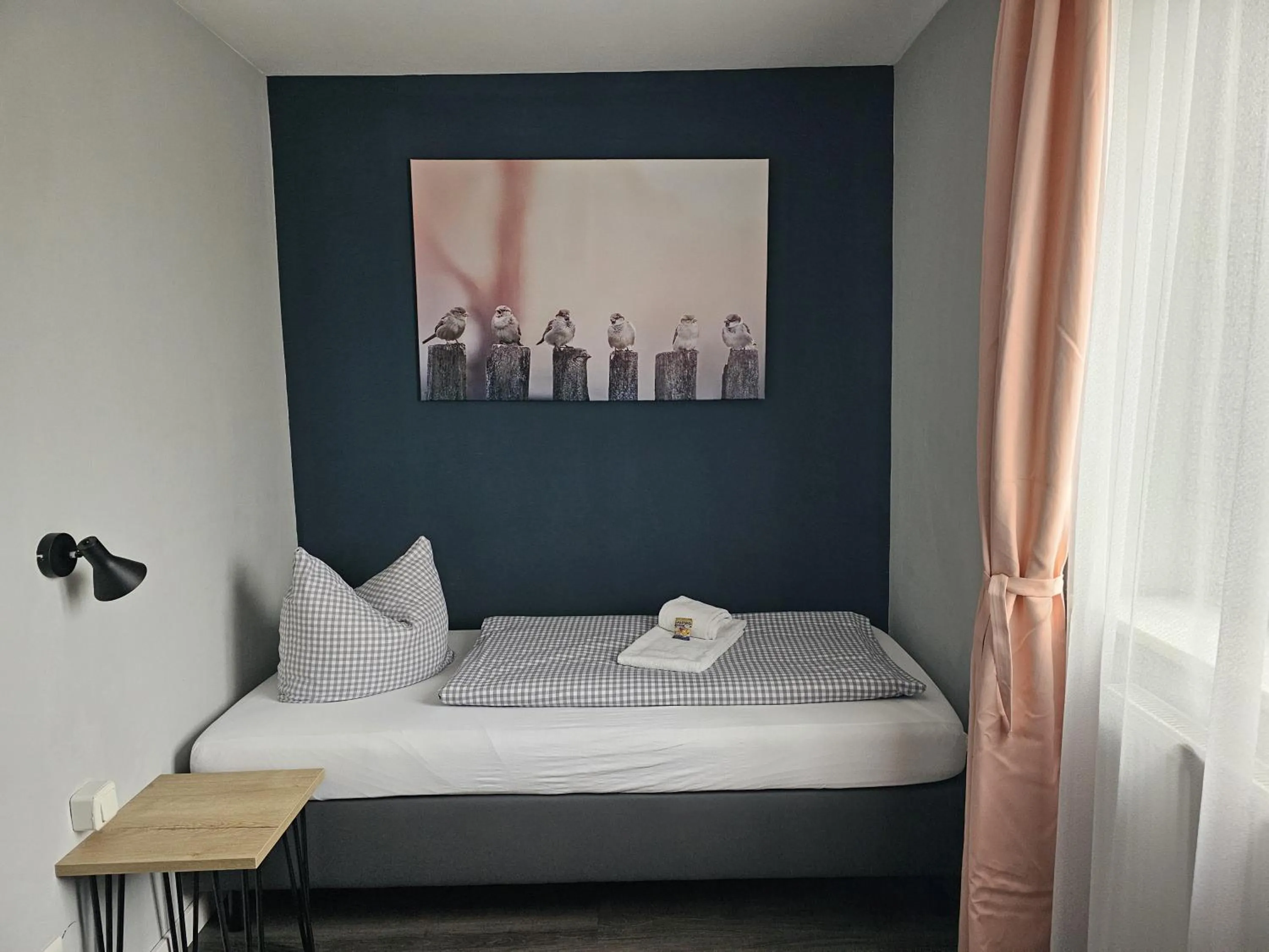 Photo of the whole room, Bed in ARRIVEL Pension Pliening - bisher Novitel