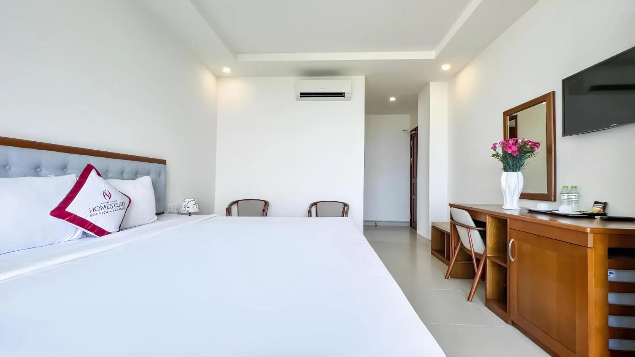 Bed in Homestead Seaview Phu Quoc Hotel