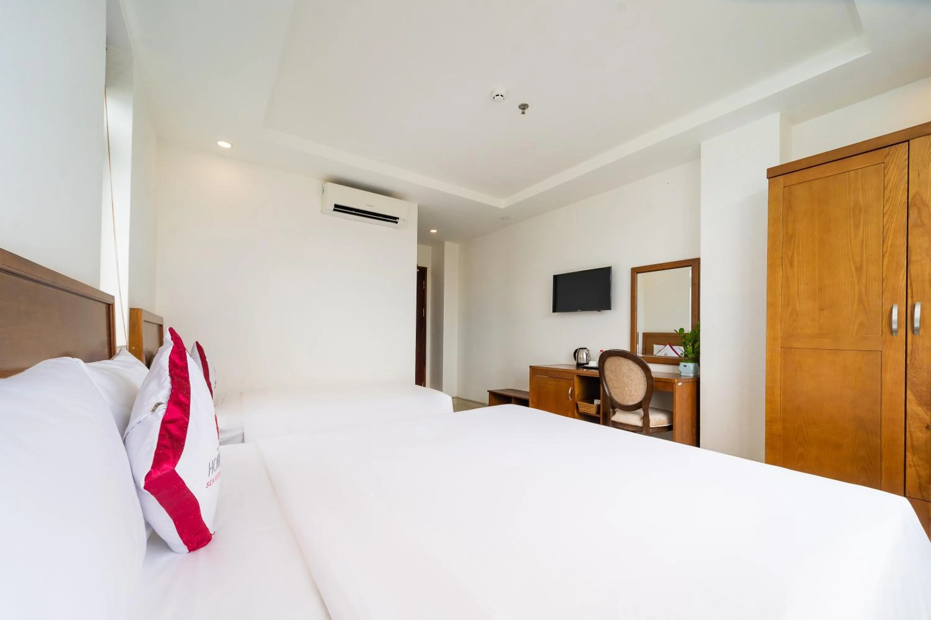 Bed in Homestead Seaview Phu Quoc Hotel