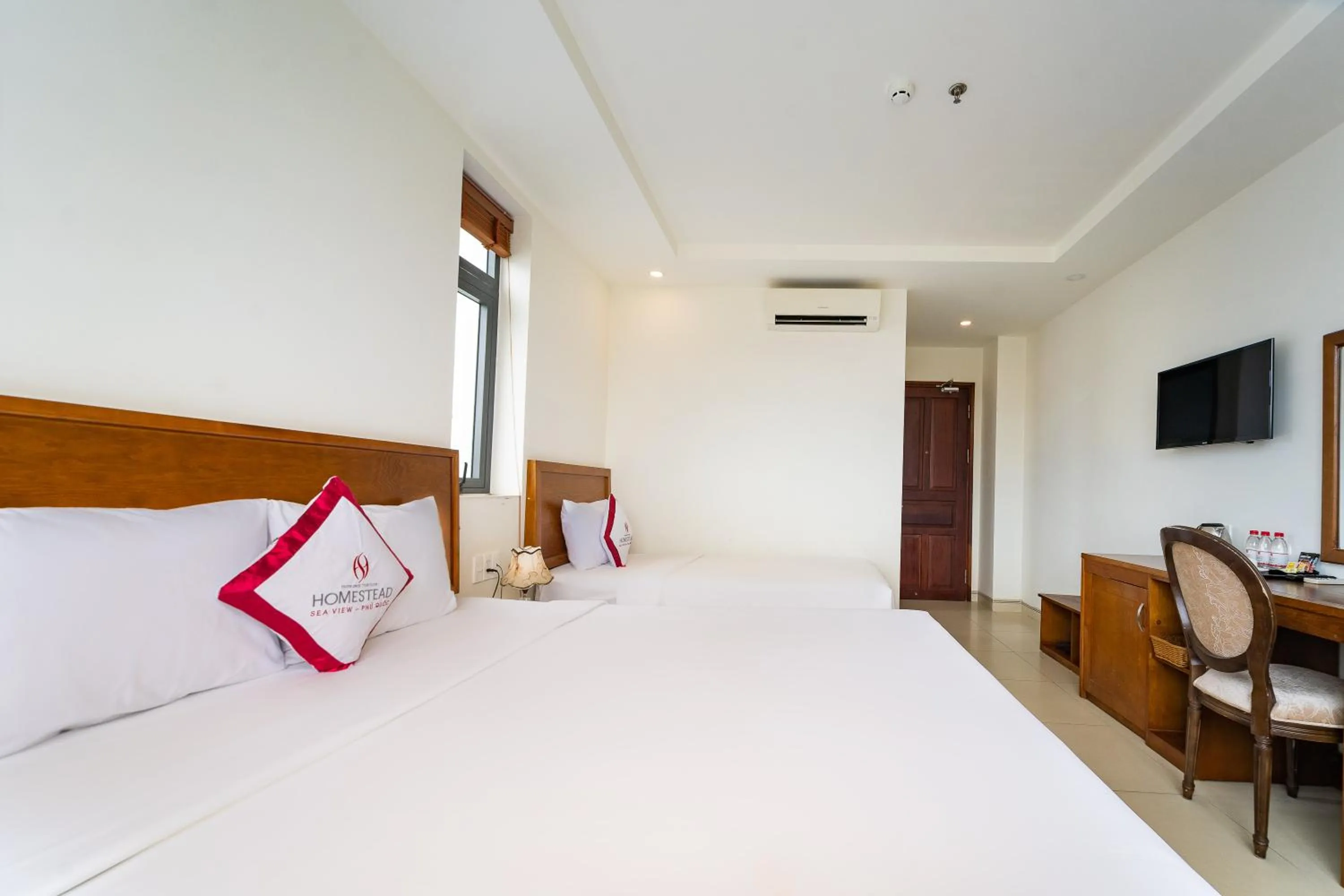 Bed in Homestead Seaview Phu Quoc Hotel