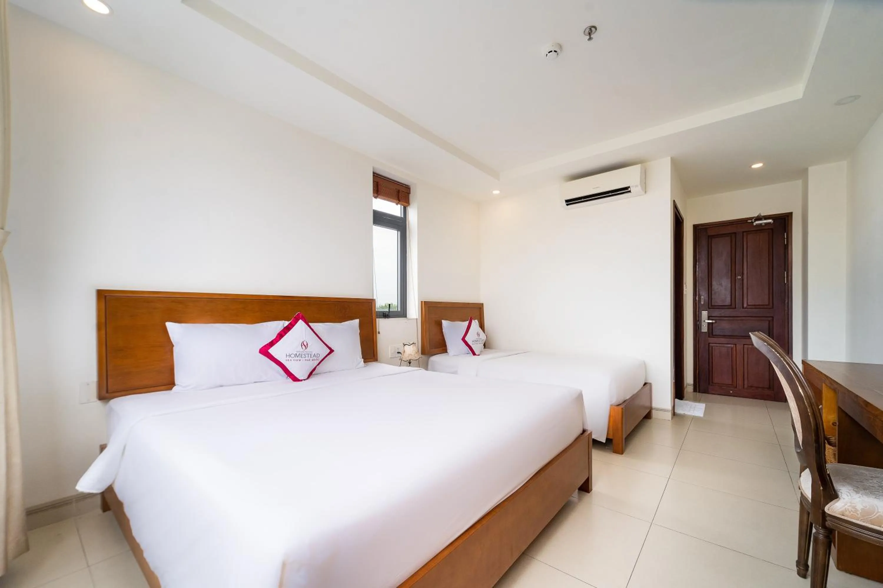 Bed in Homestead Seaview Phu Quoc Hotel